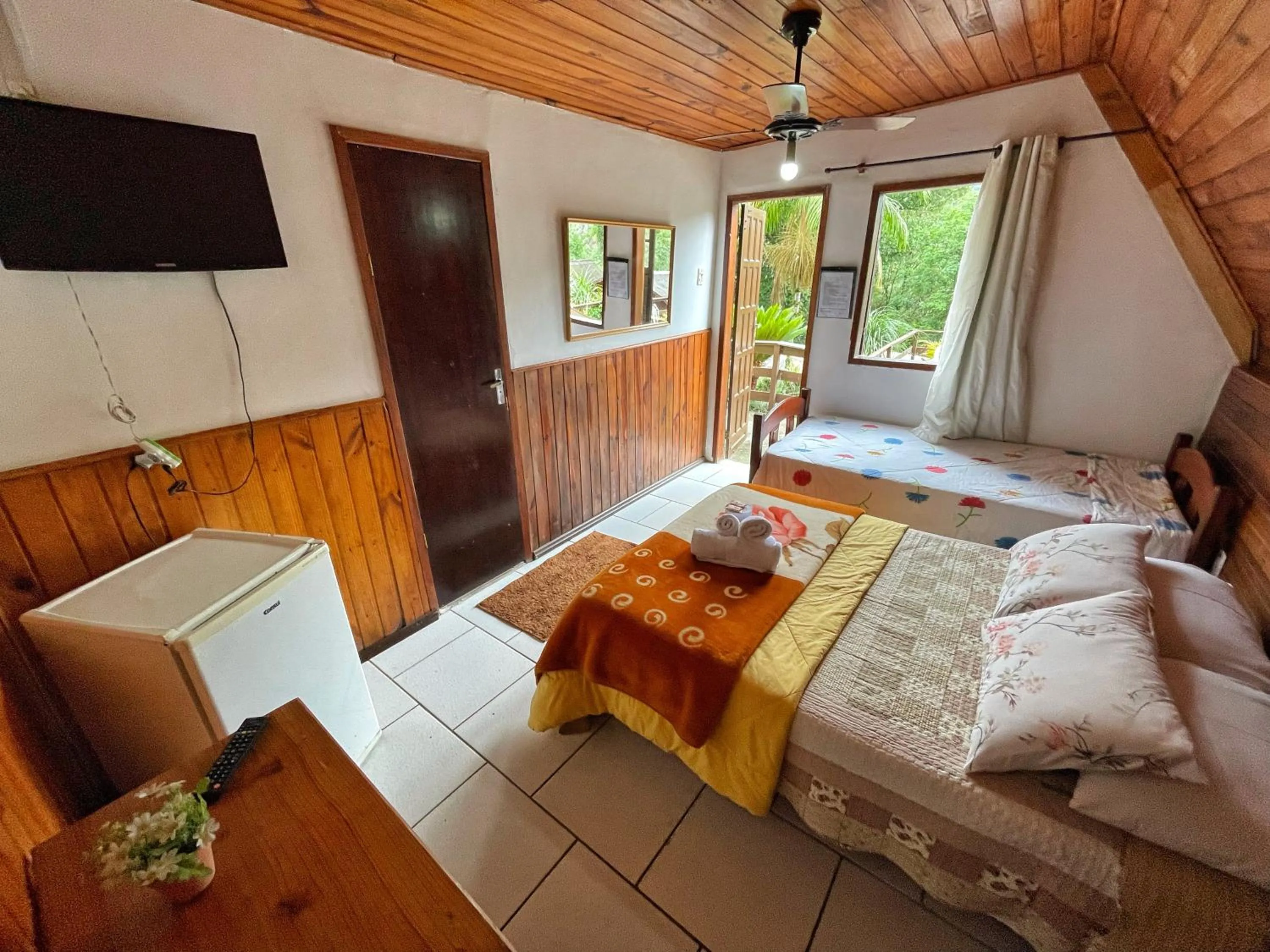 Bed in Pousada Colibri Serrano