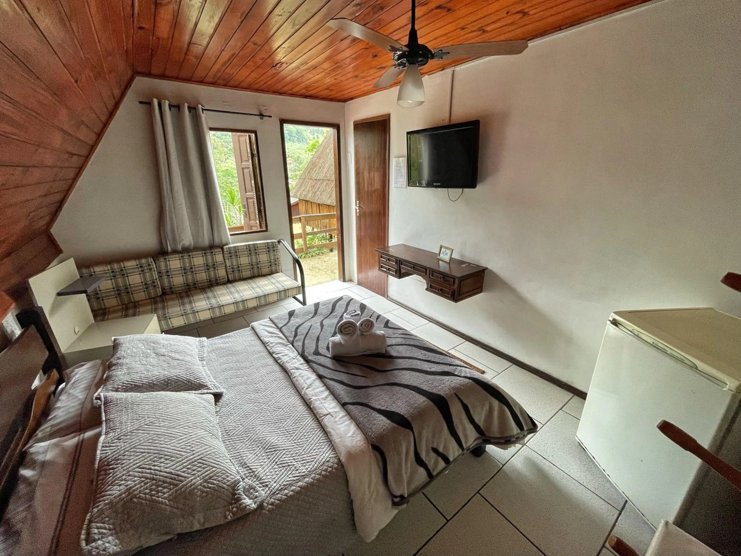 Bed in Pousada Colibri Serrano