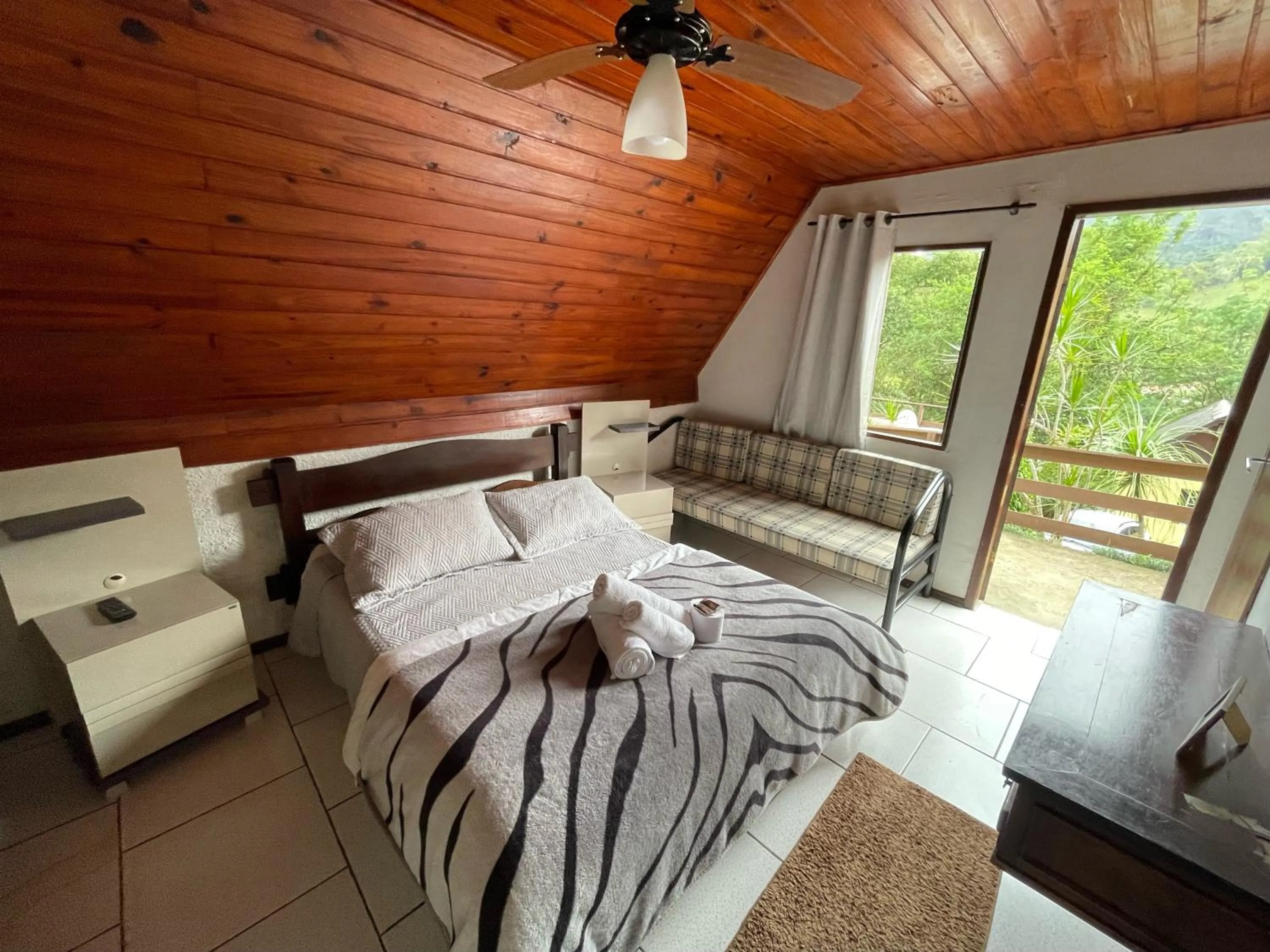 Bed in Pousada Colibri Serrano