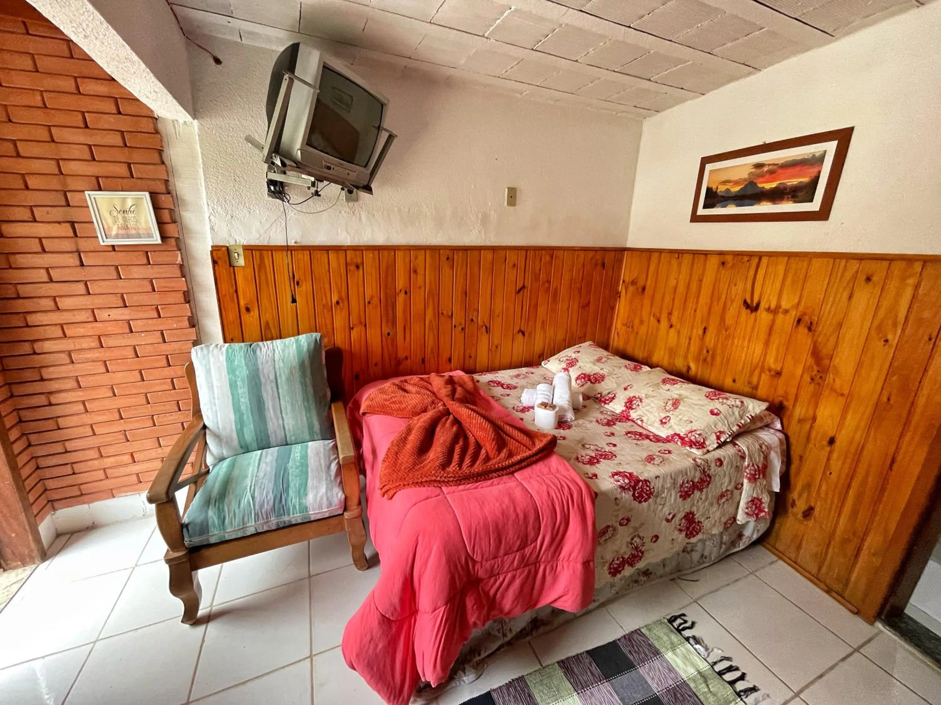 Bed in Pousada Colibri Serrano