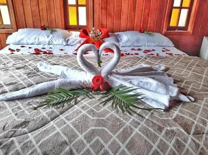 Bed in Pousada Colibri Serrano