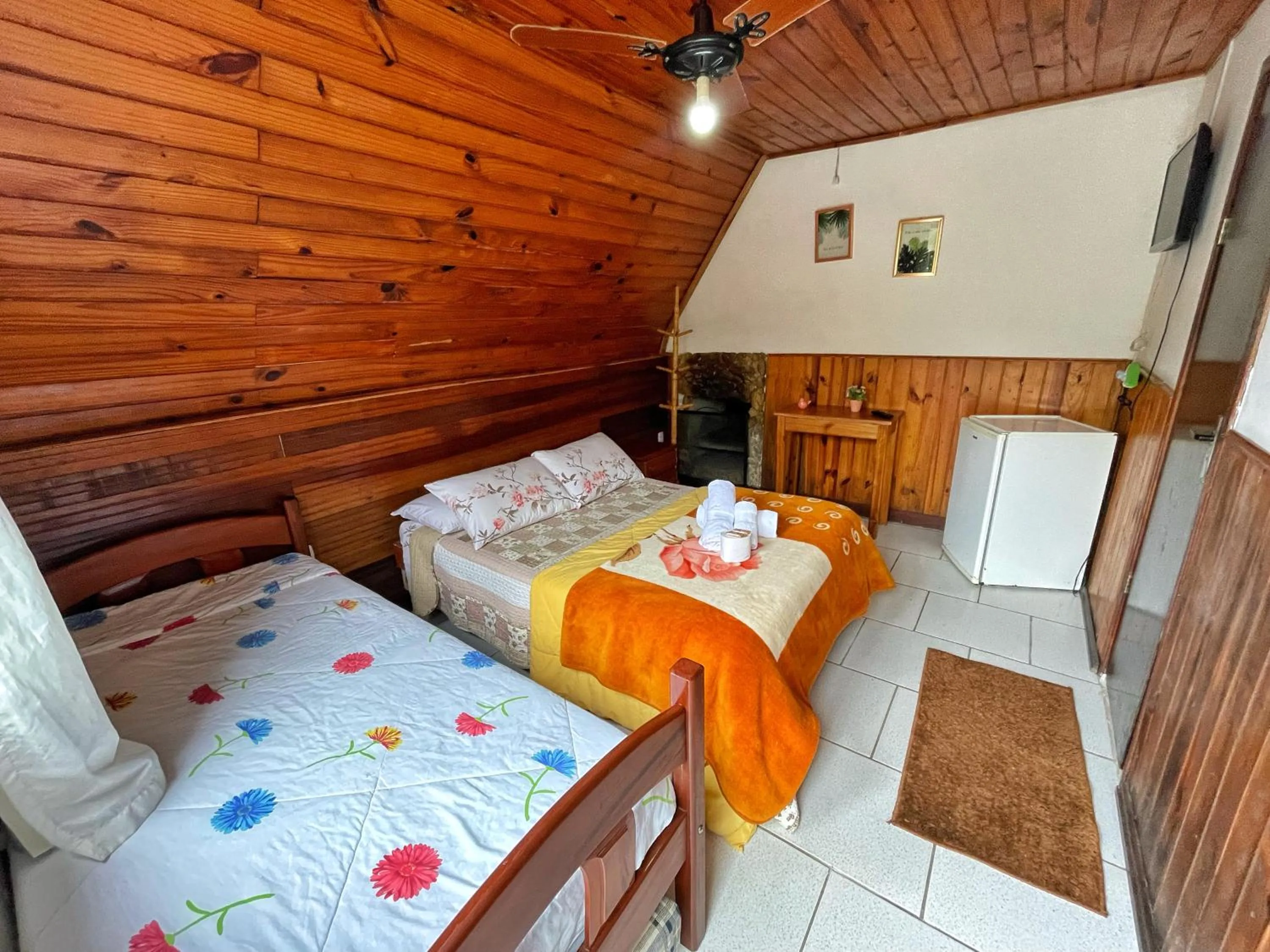 Bed in Pousada Colibri Serrano