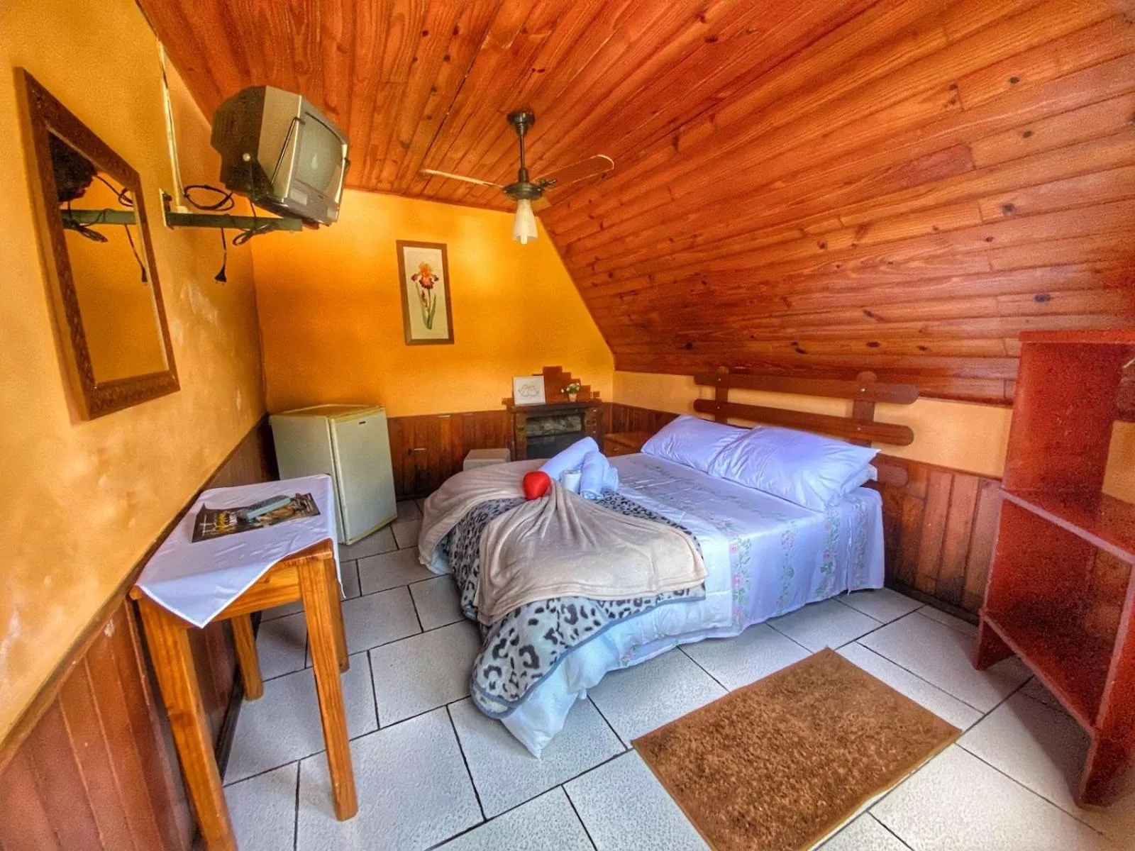 Bed in Pousada Colibri Serrano