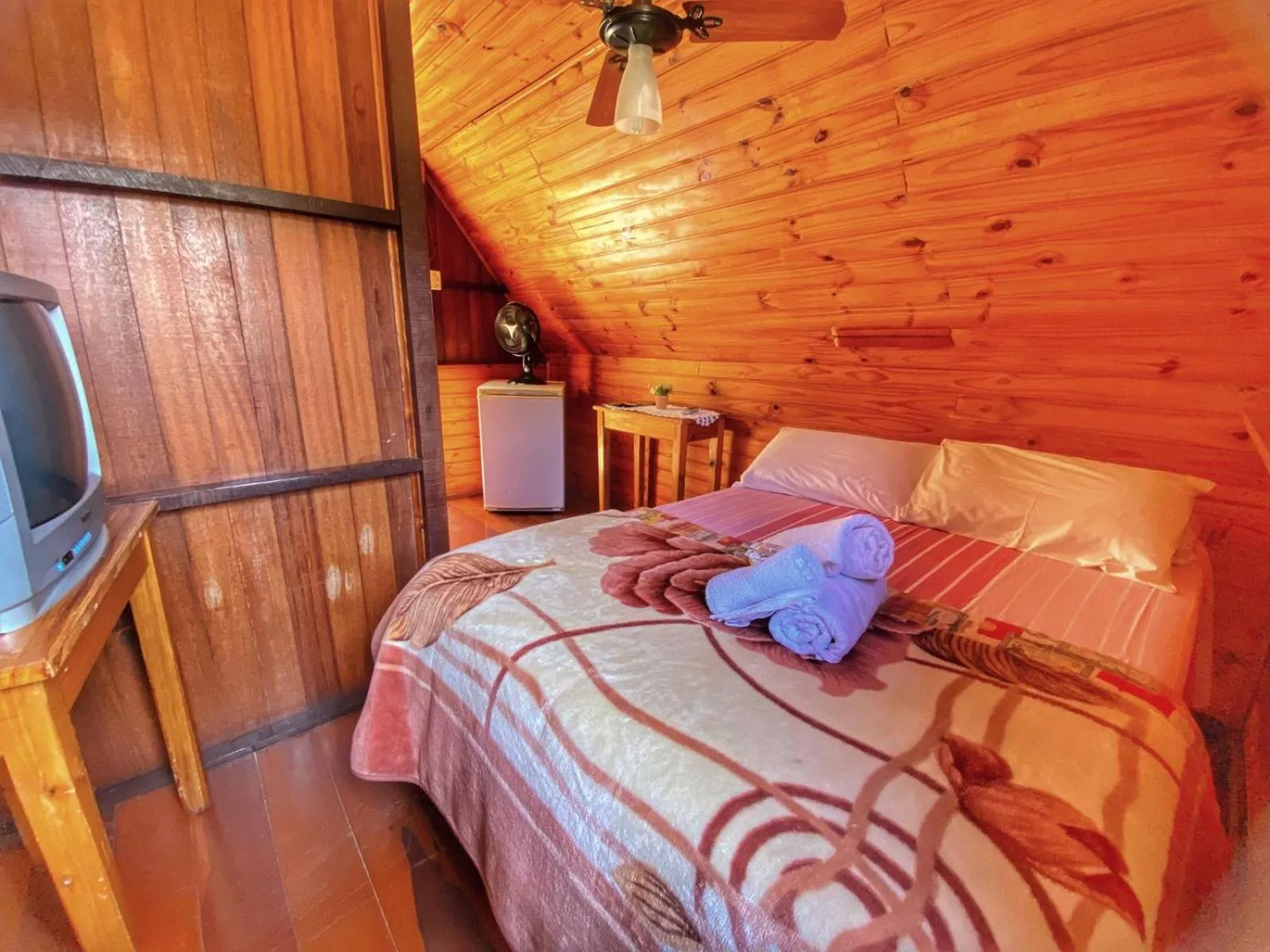 Bed in Pousada Colibri Serrano