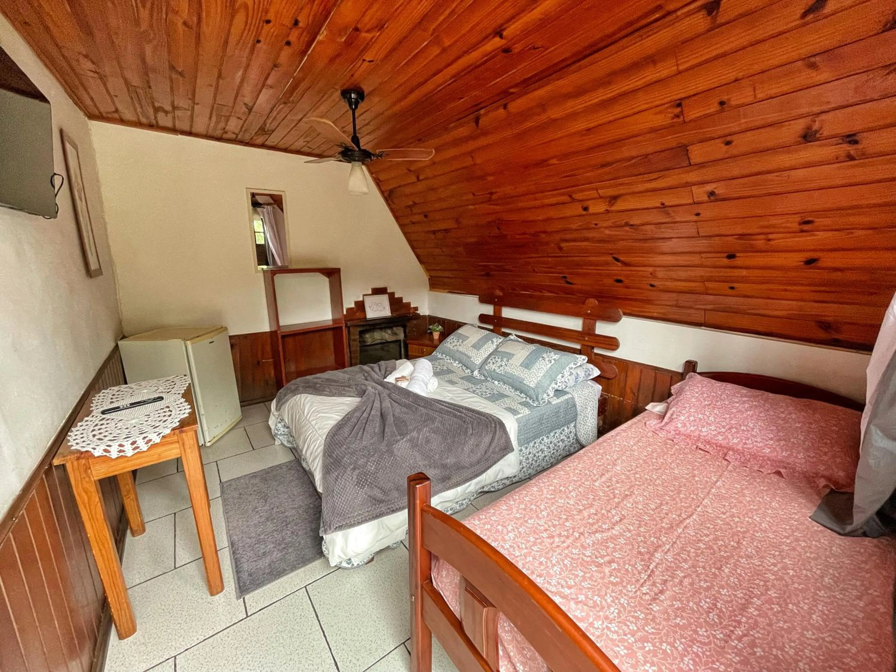 Bed in Pousada Colibri Serrano