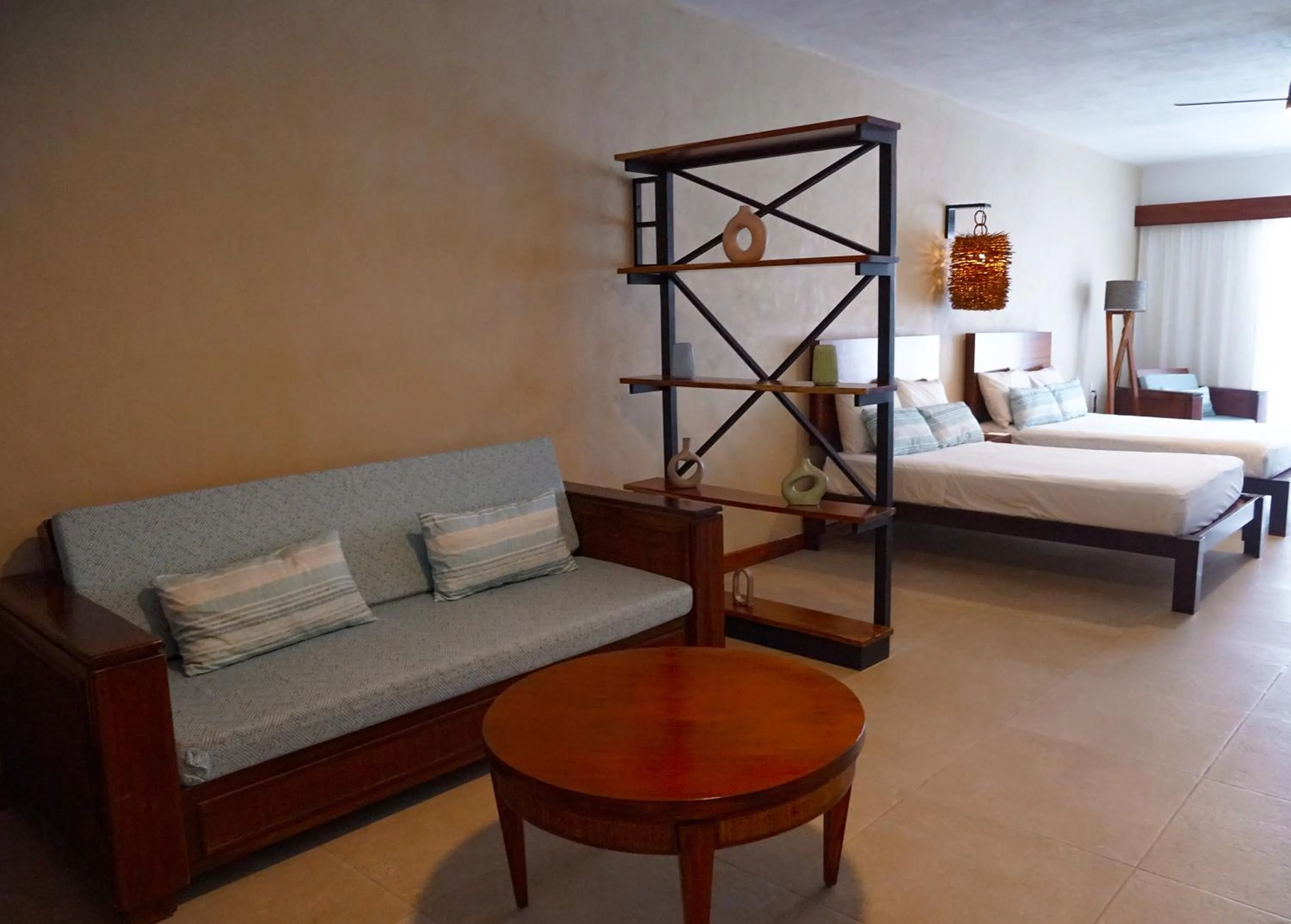 Living room, Bed in The Mint Resort Isla Mujeres