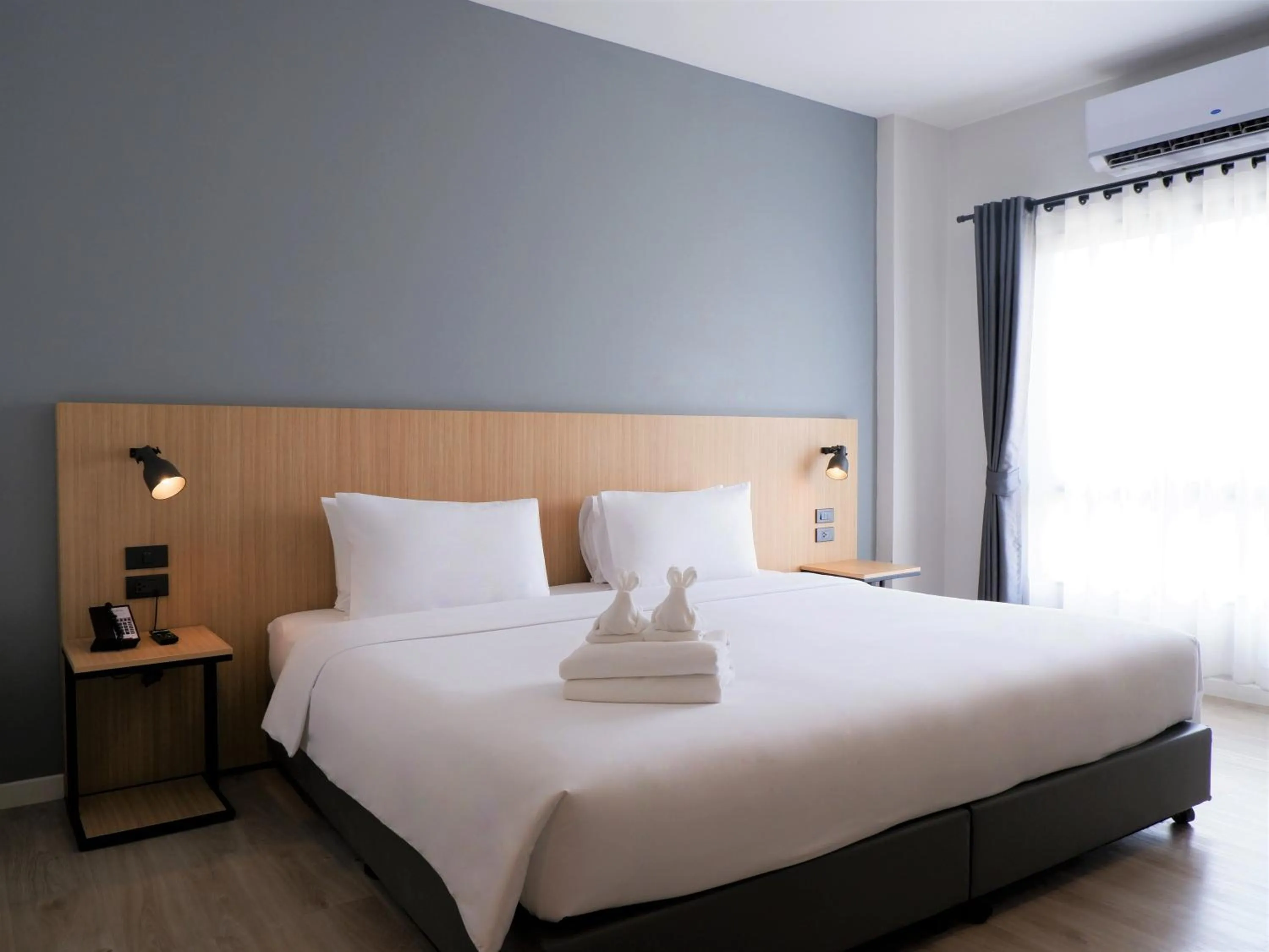 Bed in bliQ Hotel Chanthaburi