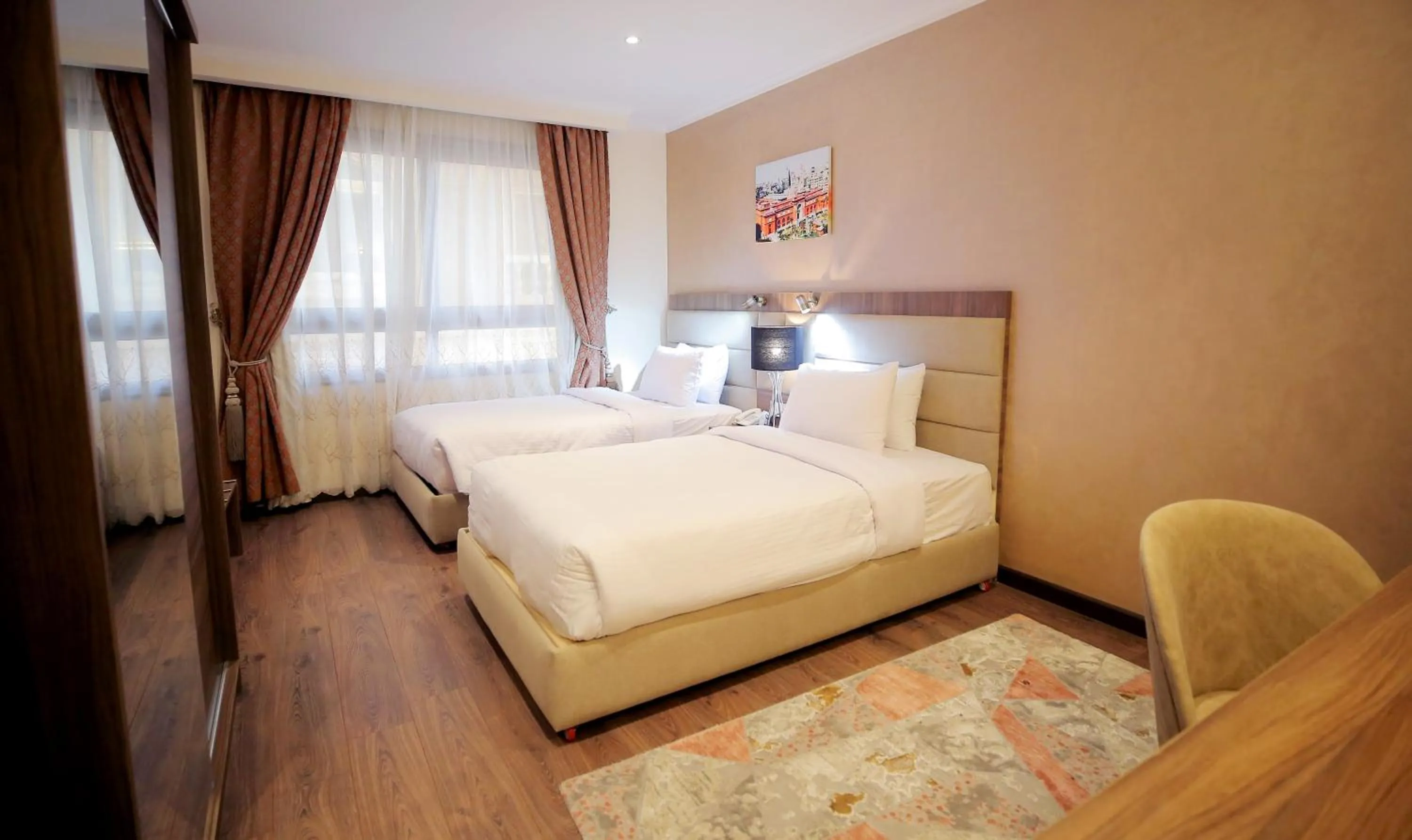 Bed in Cairo Taj Hotels & Suites - Dokki