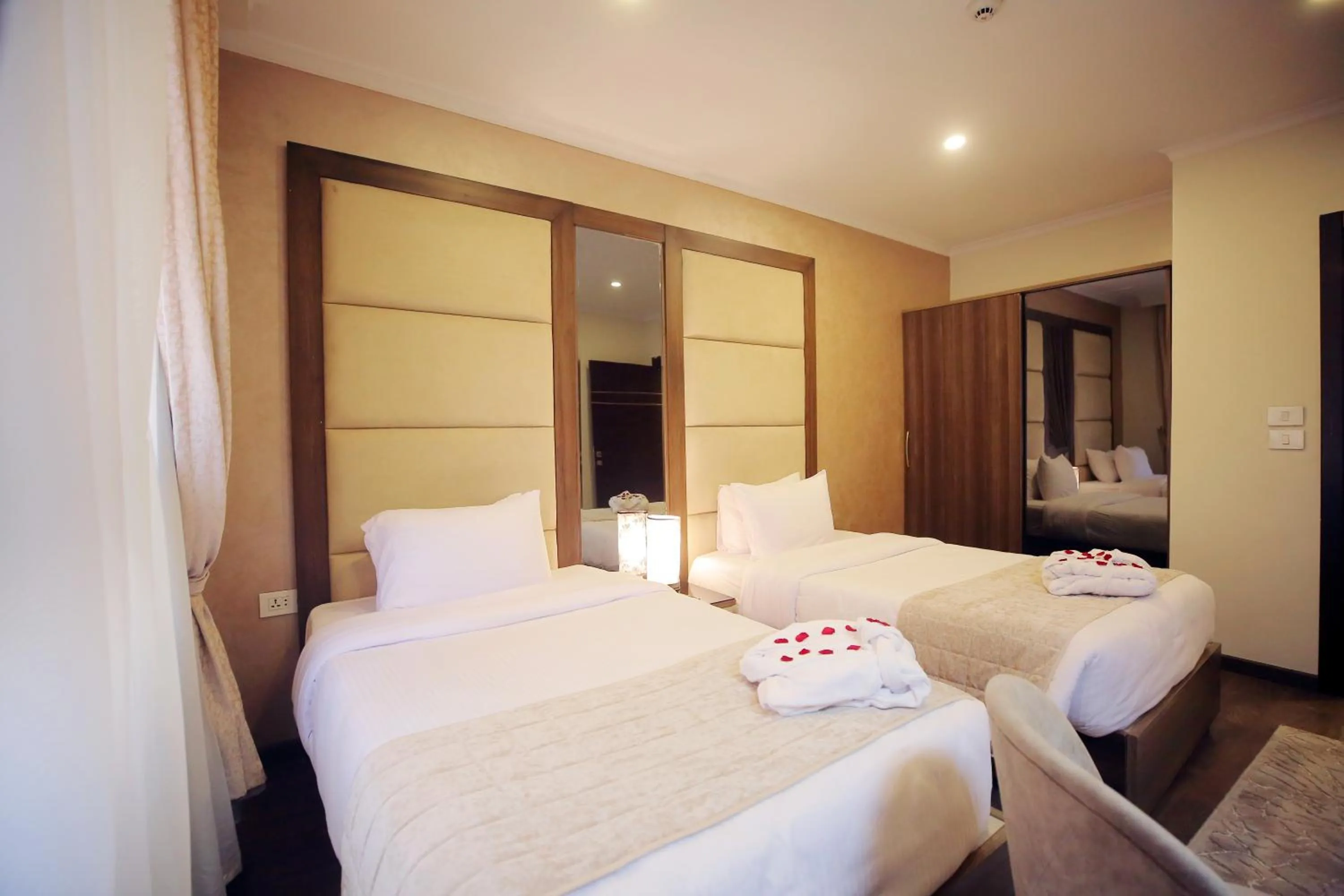 Bed in Cairo Taj Hotels & Suites - Dokki