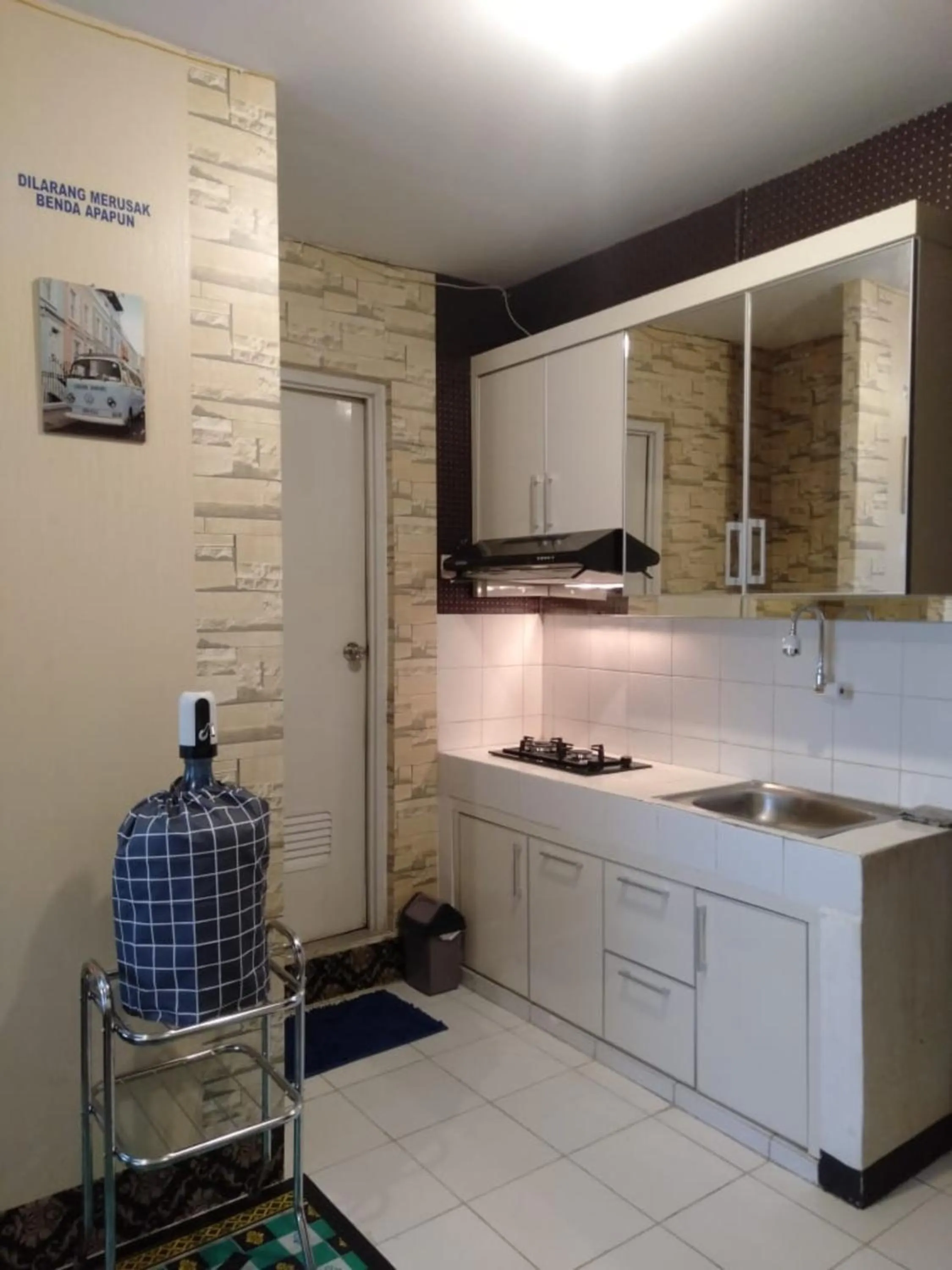 Kitchen or kitchenette in MyStayPro Sentra Timur