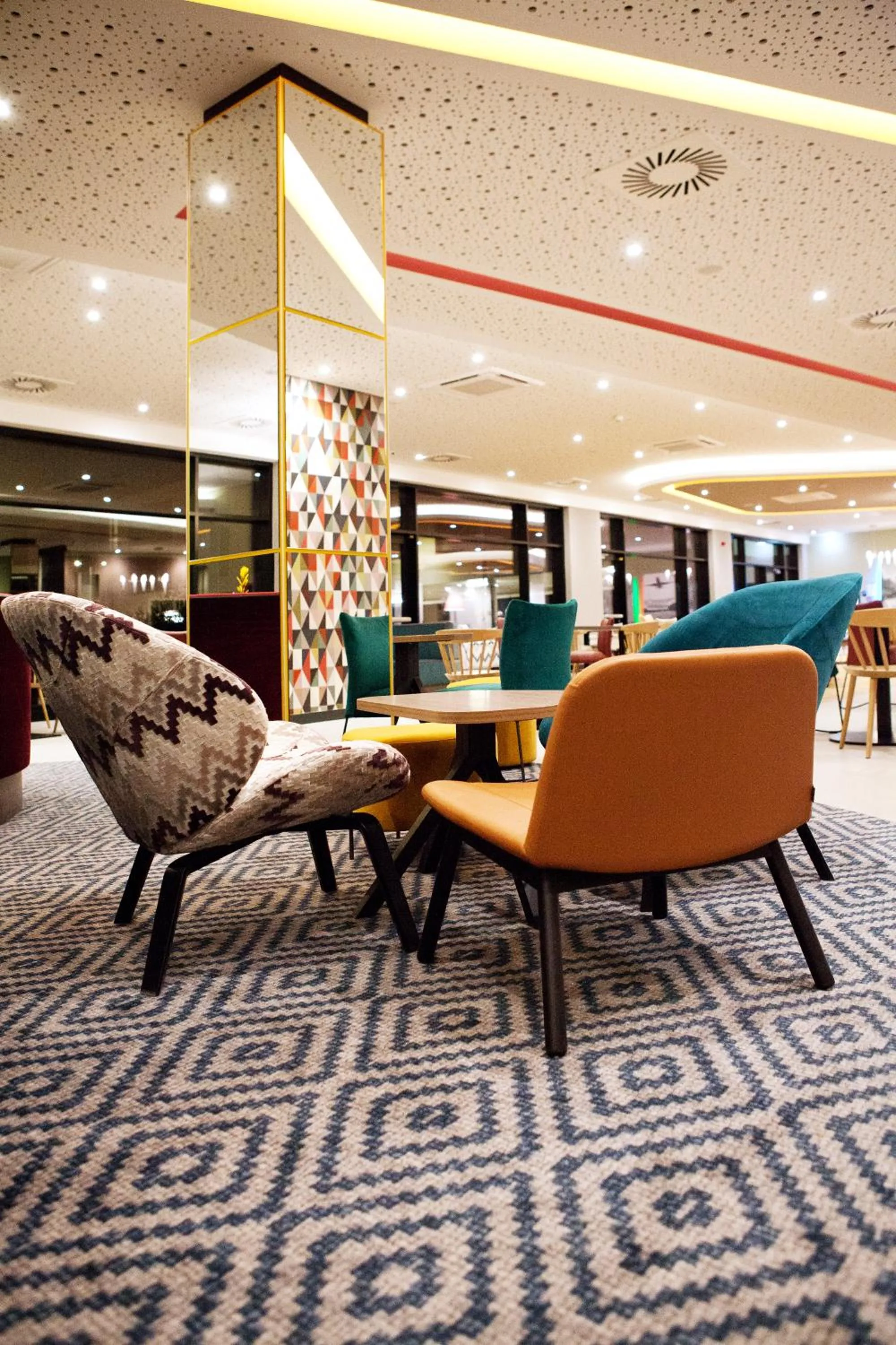 Living room in Hampton by Hilton Munich Airport South