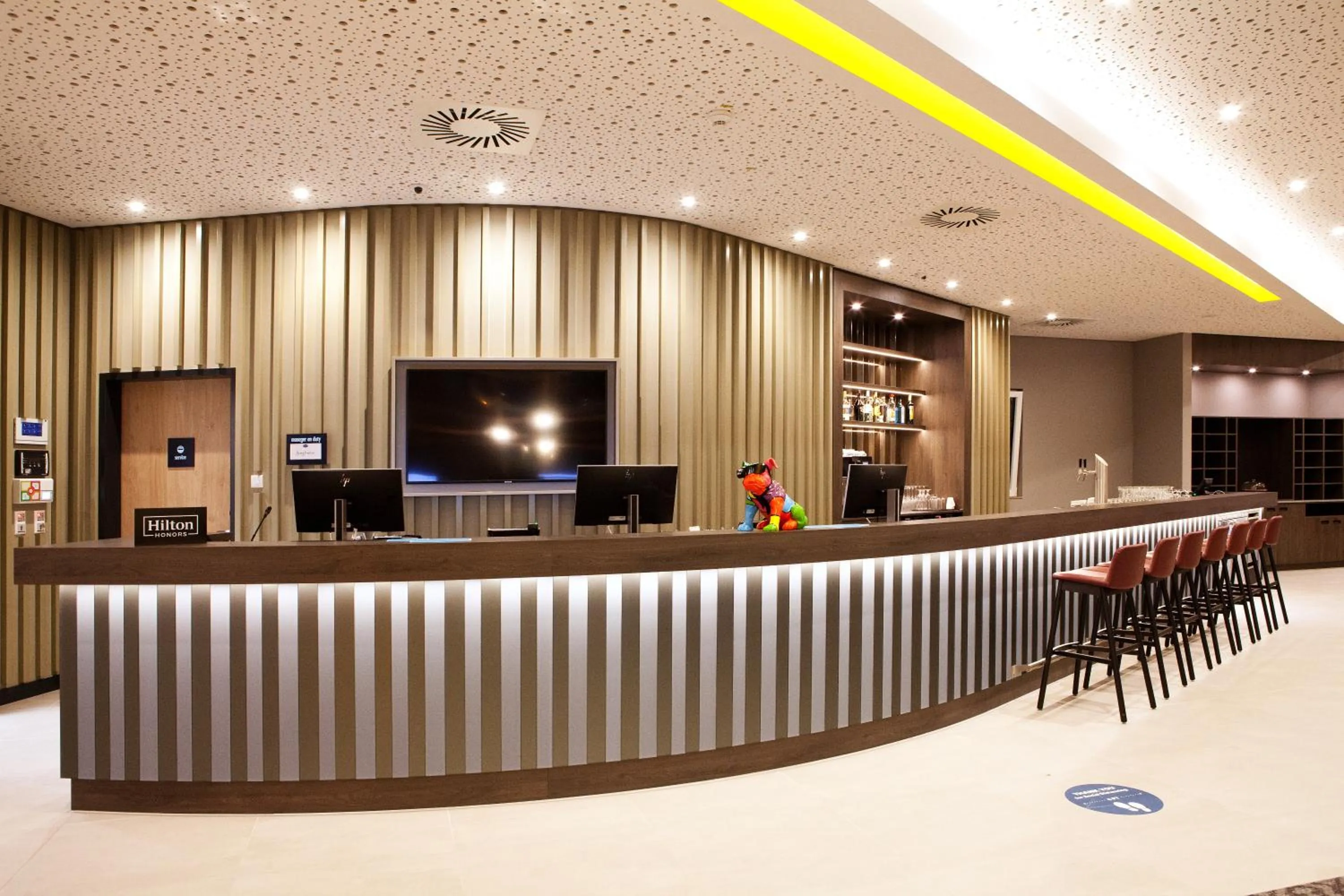 Lobby or reception in Hampton by Hilton Munich Airport South