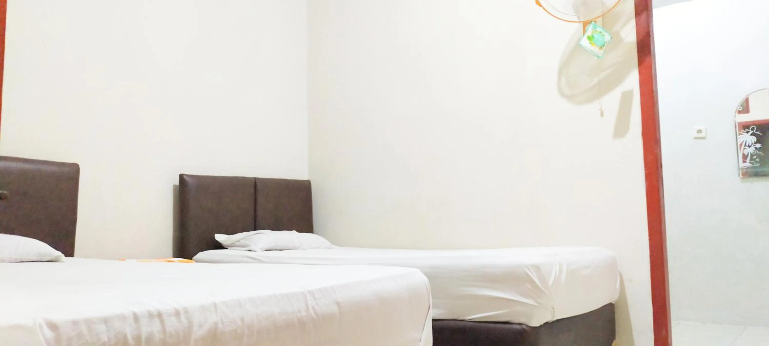 Bed in Aqsa Guest House Banjarsari