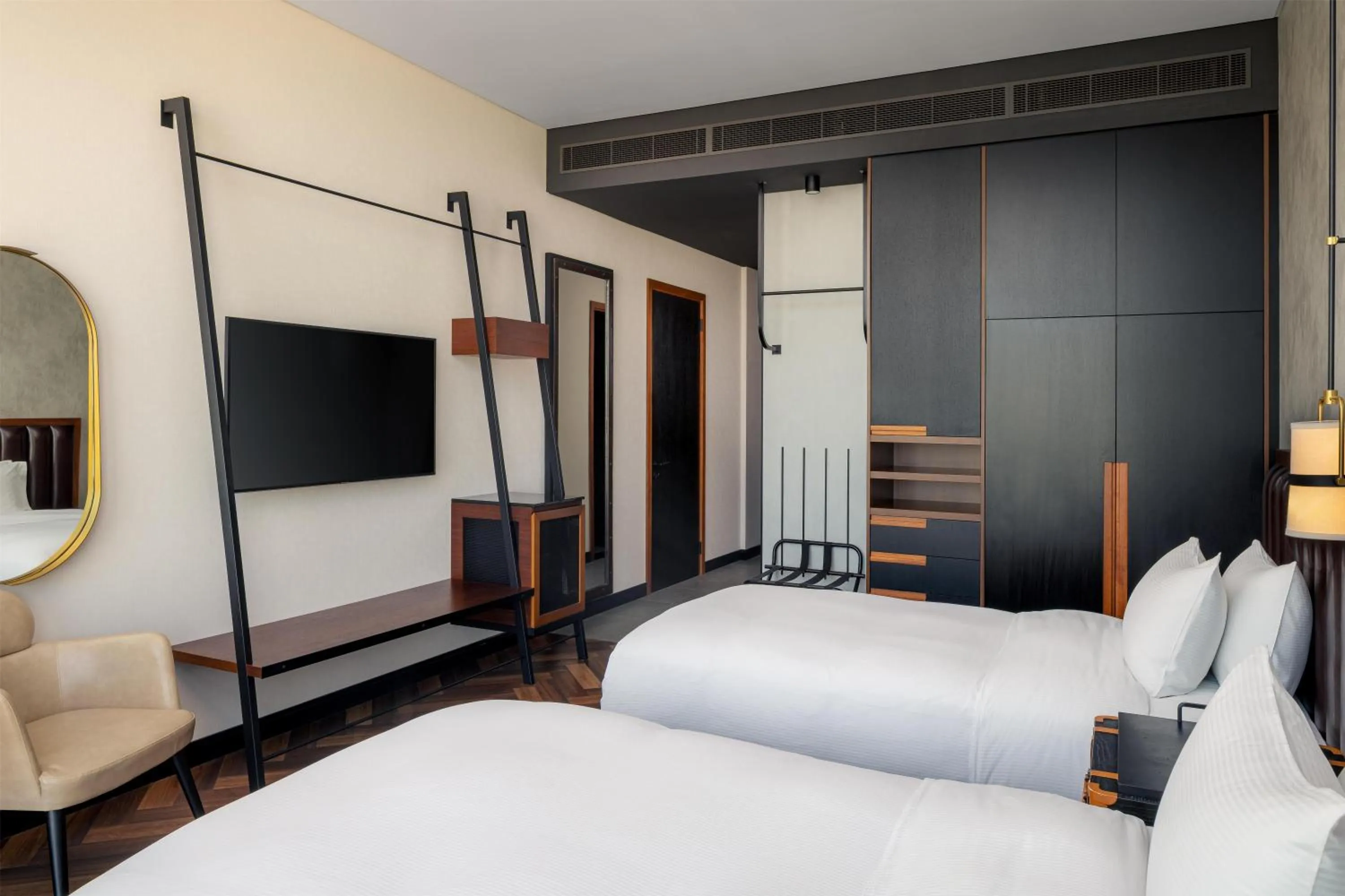 Bed in DoubleTree by Hilton Dubai M Square Hotel & Residences