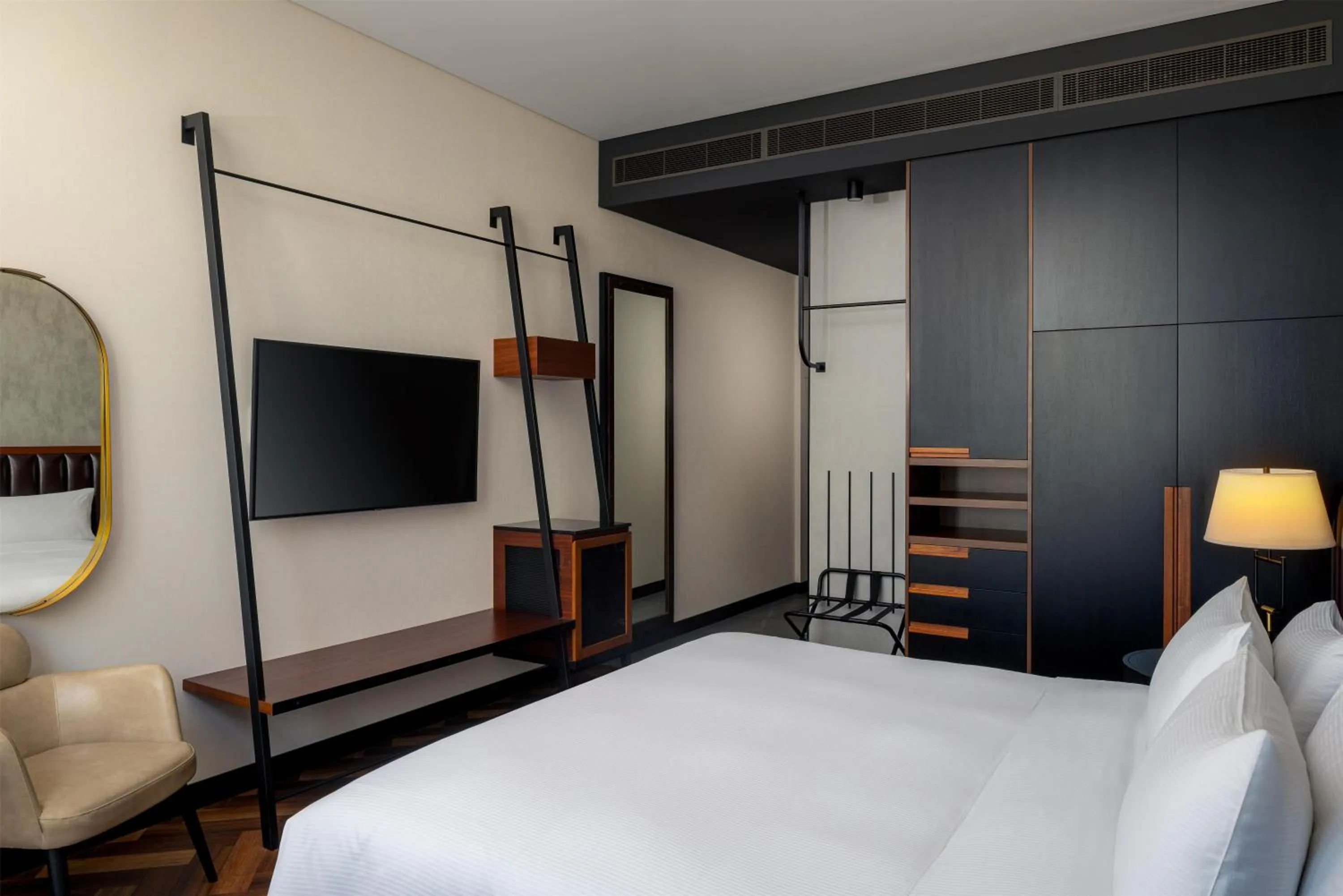 Bed in DoubleTree by Hilton Dubai M Square Hotel & Residences