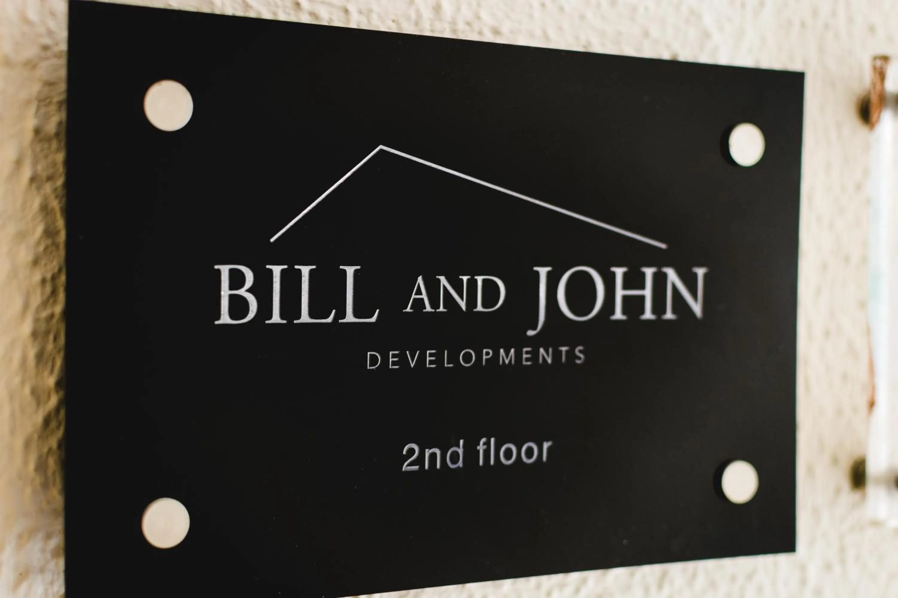 Property logo or sign in Acropolis Deluxe Apartment