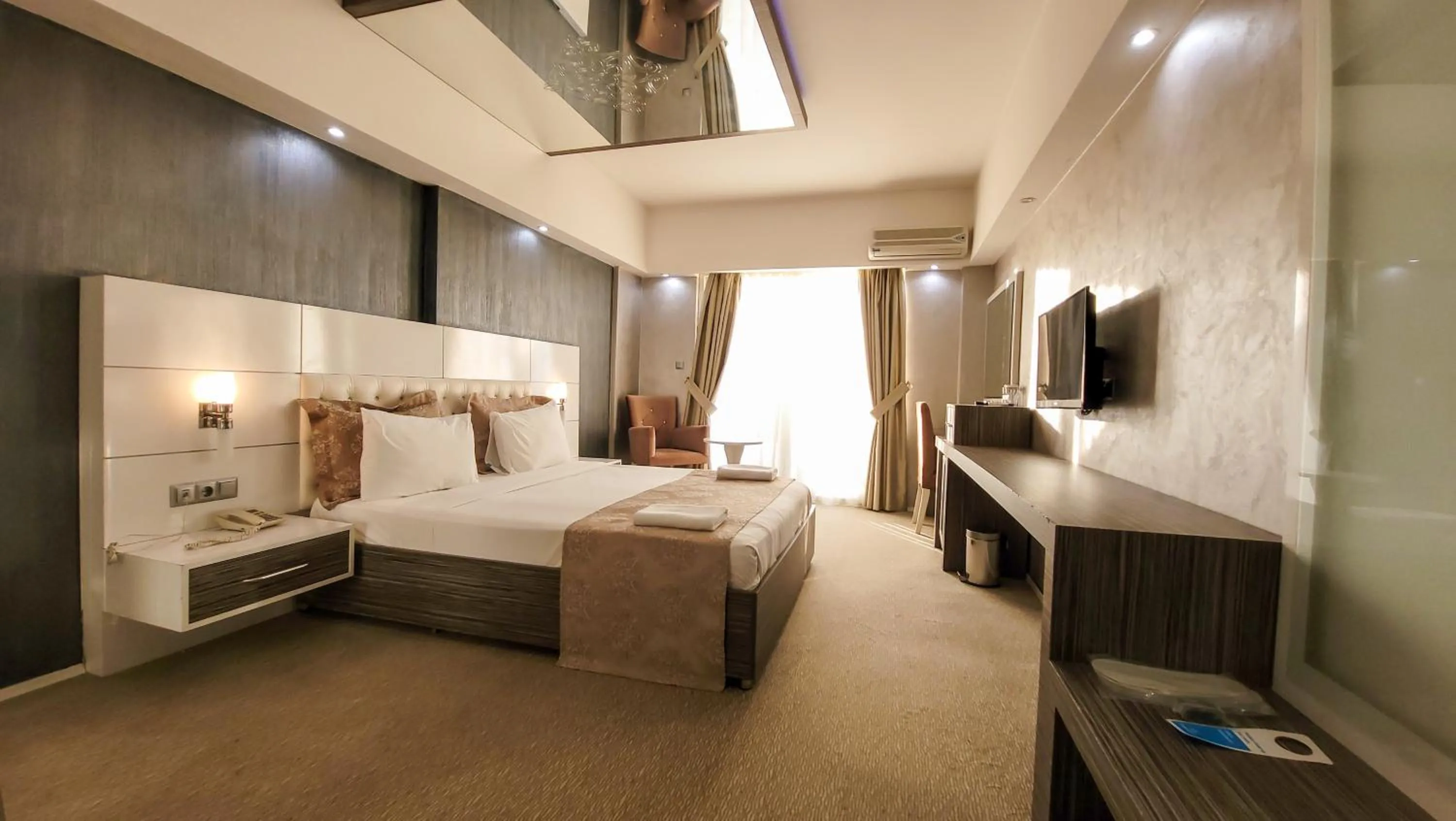 Bed in MOX Hotel Wellness & Spa