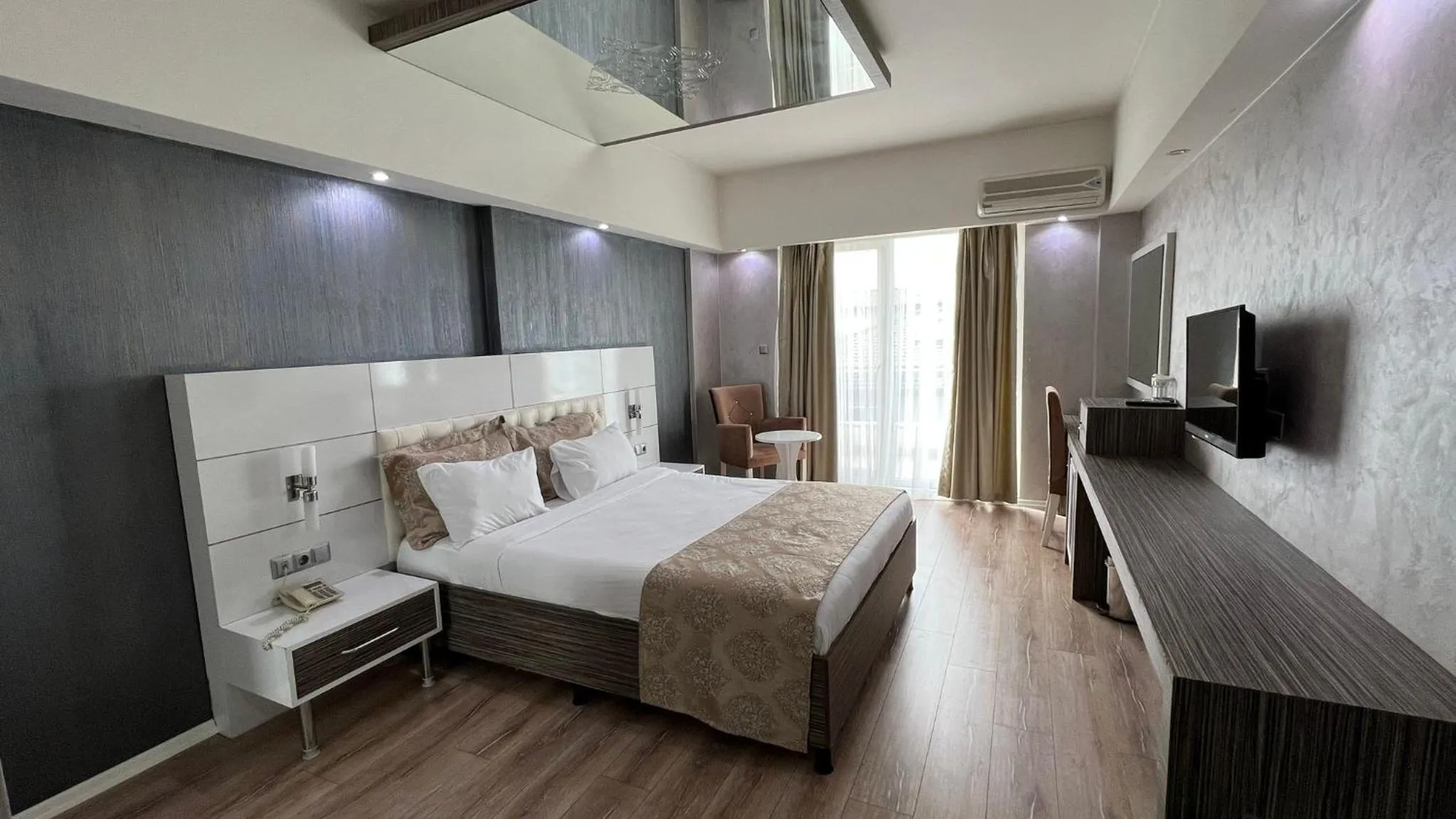 Bed in MOX Hotel Wellness & Spa