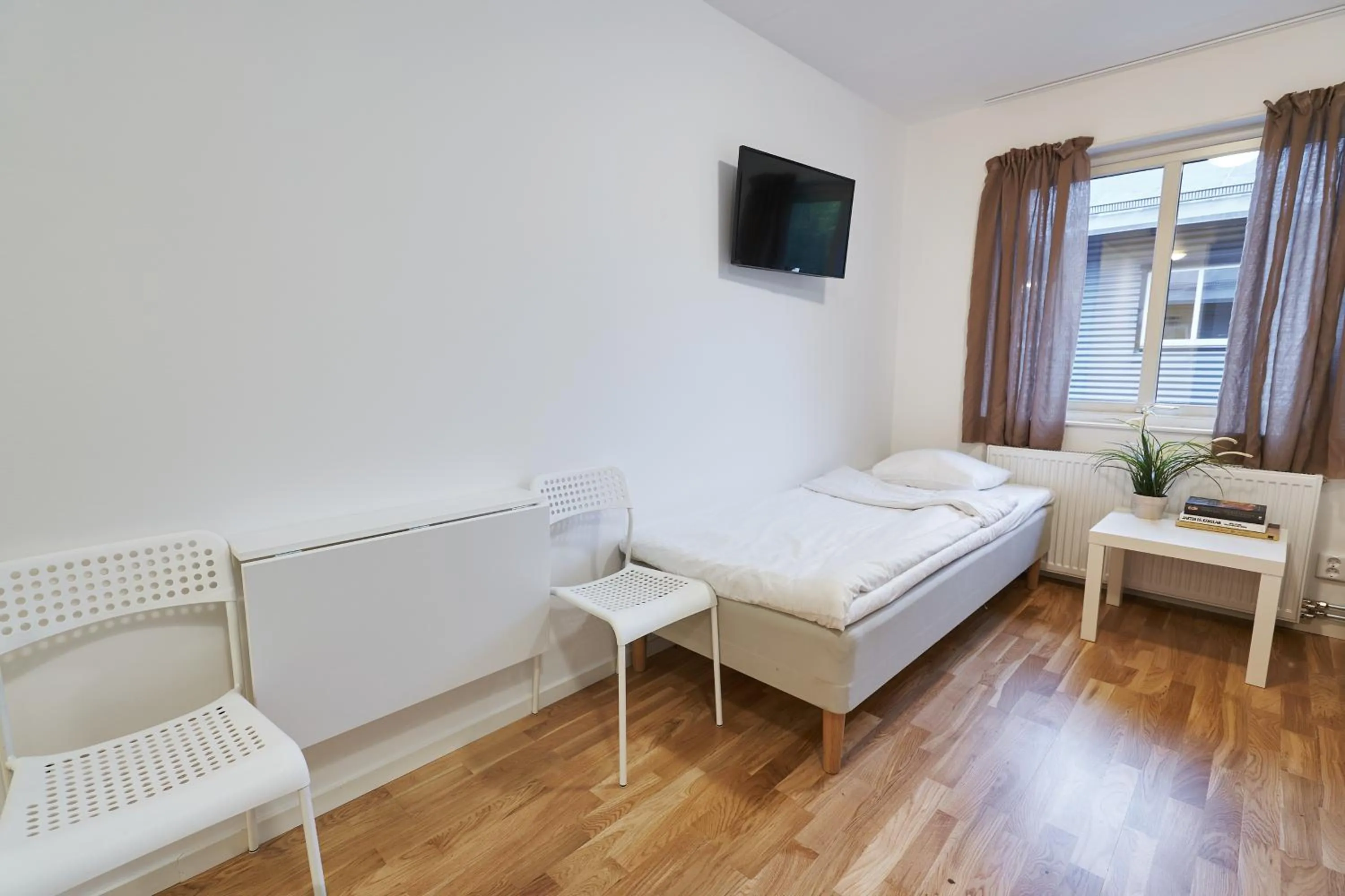 Bed in Bålsta Apartment Hotel