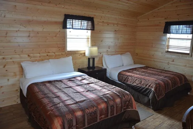 Bed in Roosevelt Inn & Suites