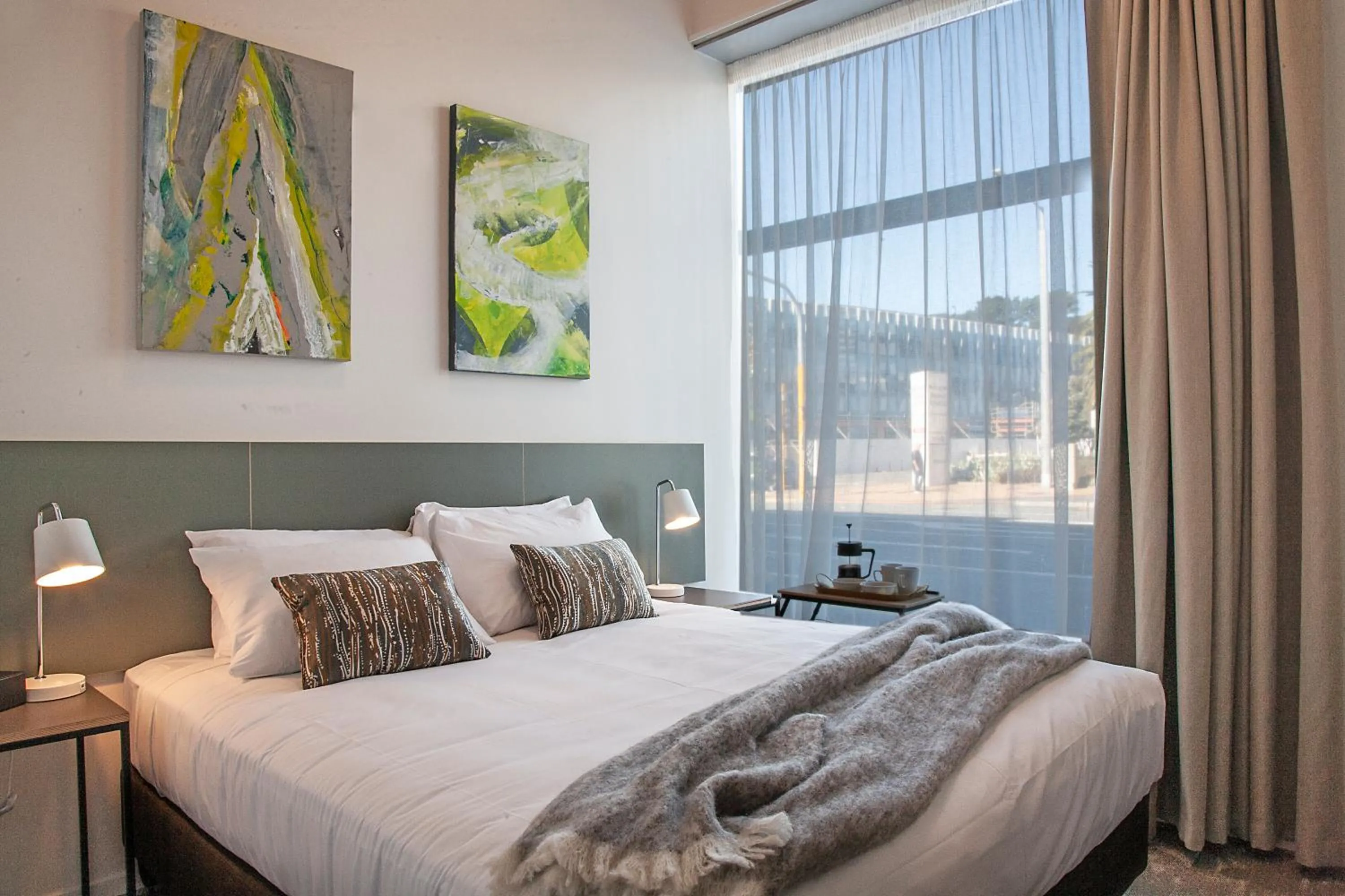 Bed in Sojourn Apartment Hotel - Riddiford