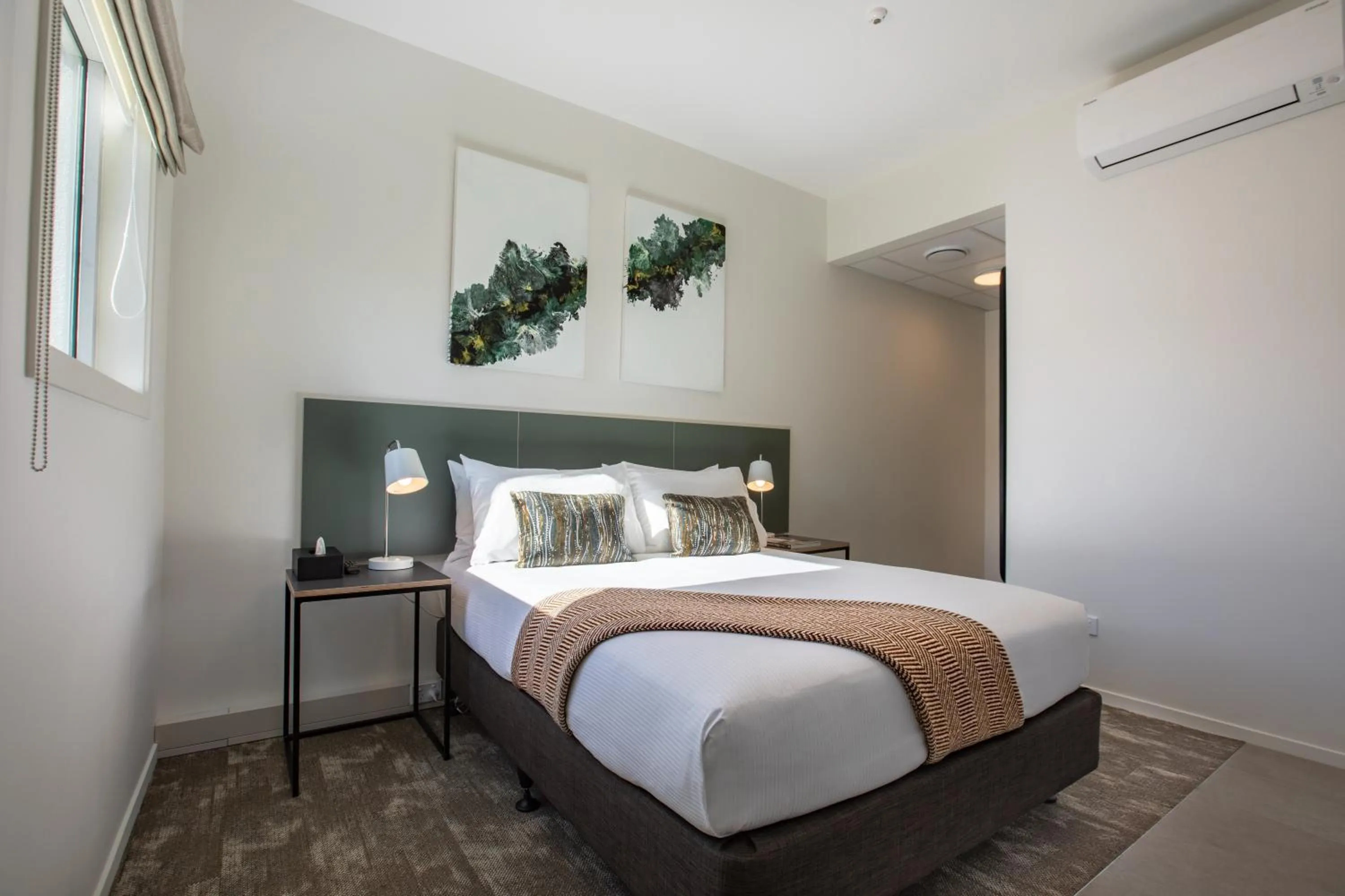 Bed in Sojourn Apartment Hotel - Riddiford