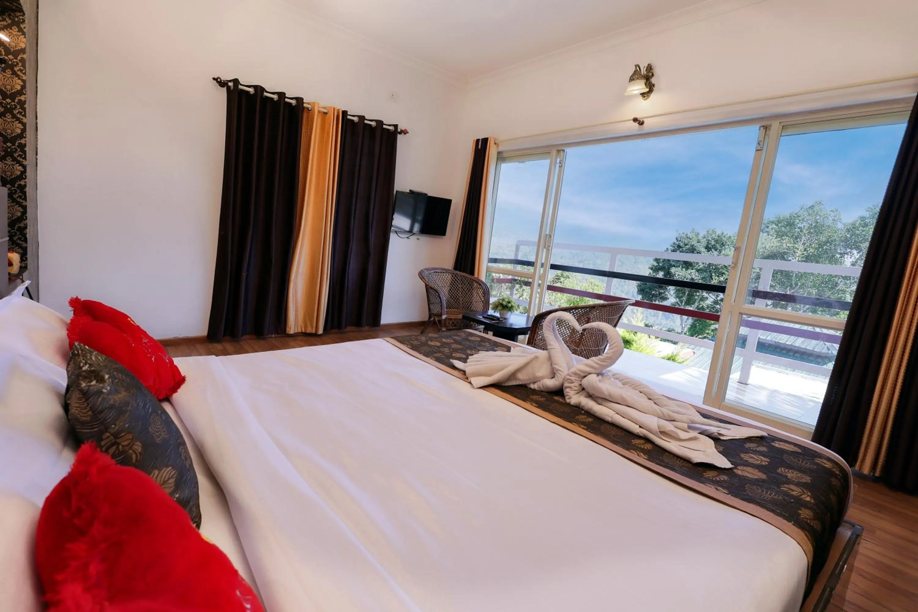 Bed in Green Trees Munnar