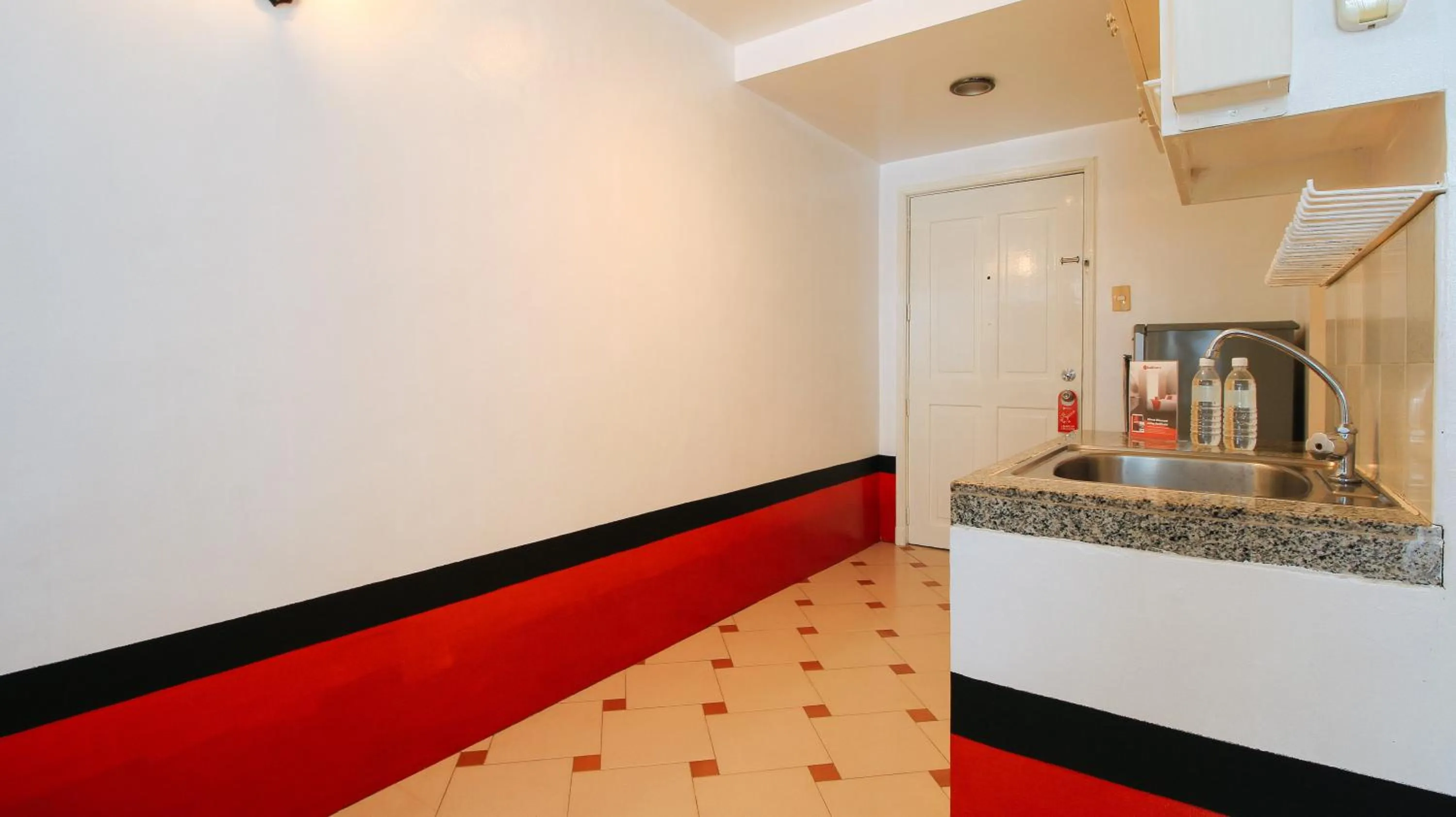 Kitchen or kitchenette in RedDoorz at The Providence Tower