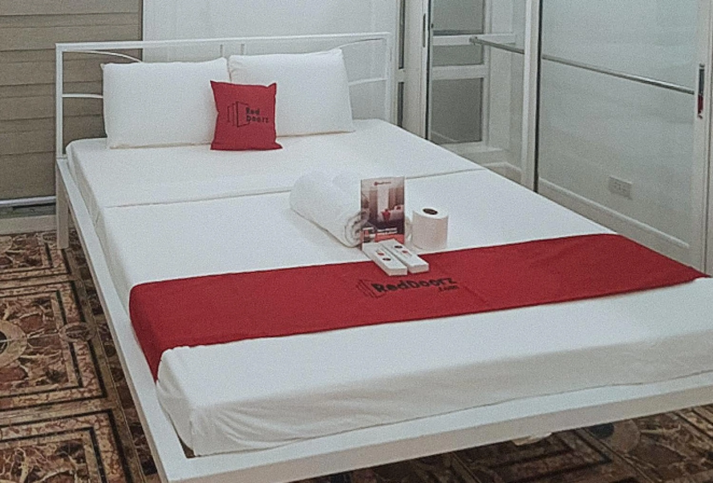 Bed in RedDoorz at The Providence Tower