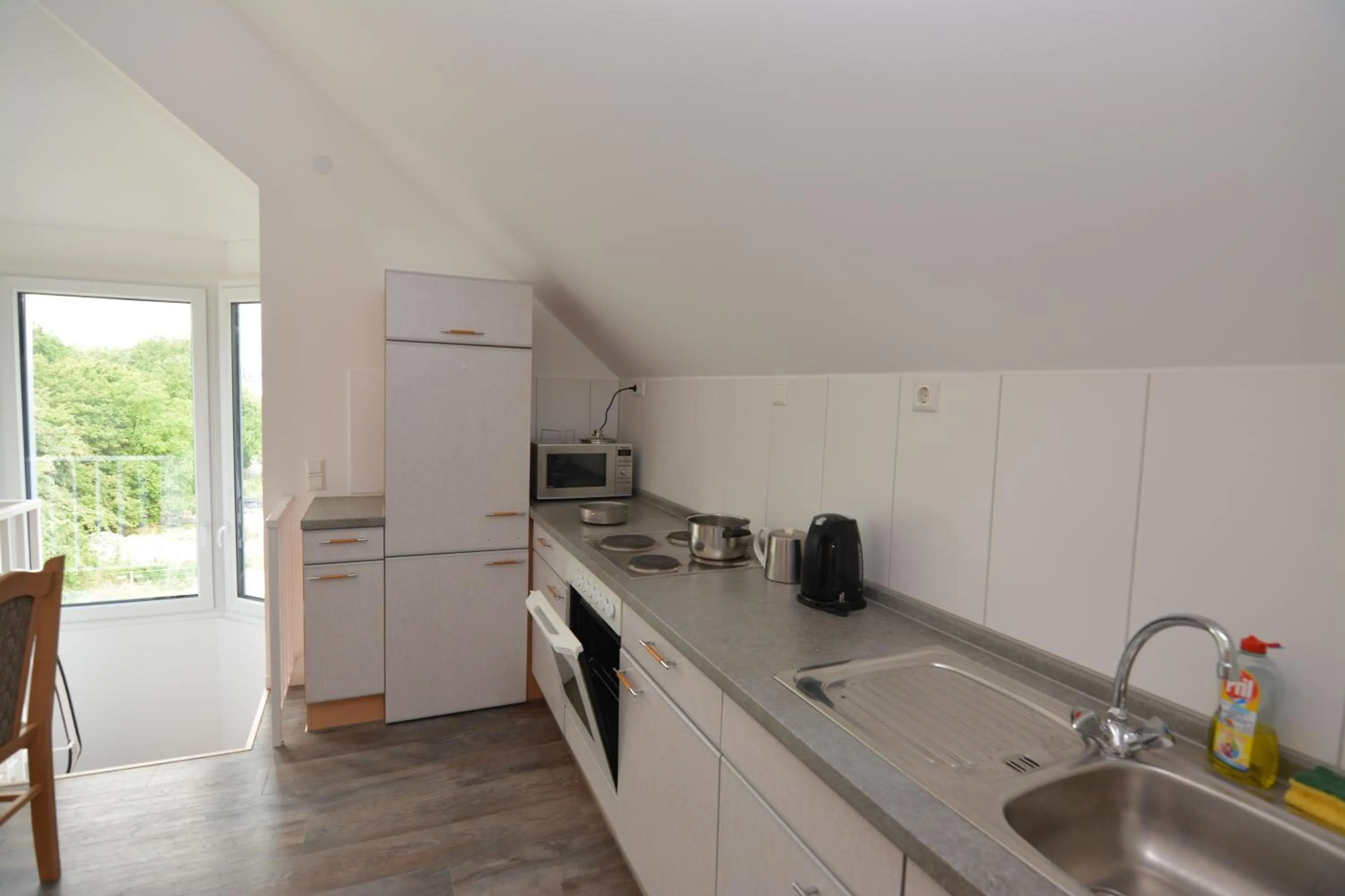 Communal kitchen in G&G Boardinghouse