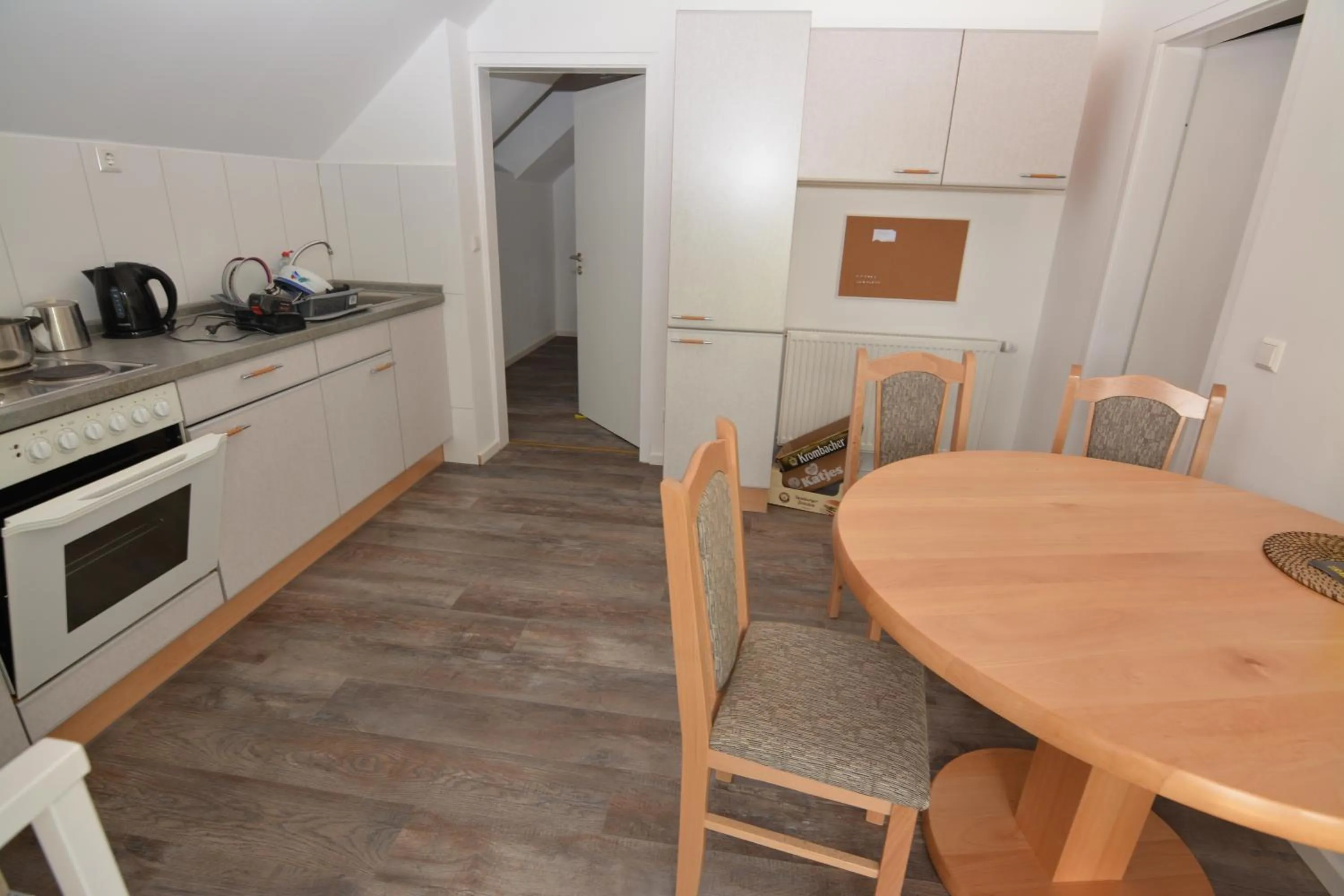 Communal kitchen in G&G Boardinghouse