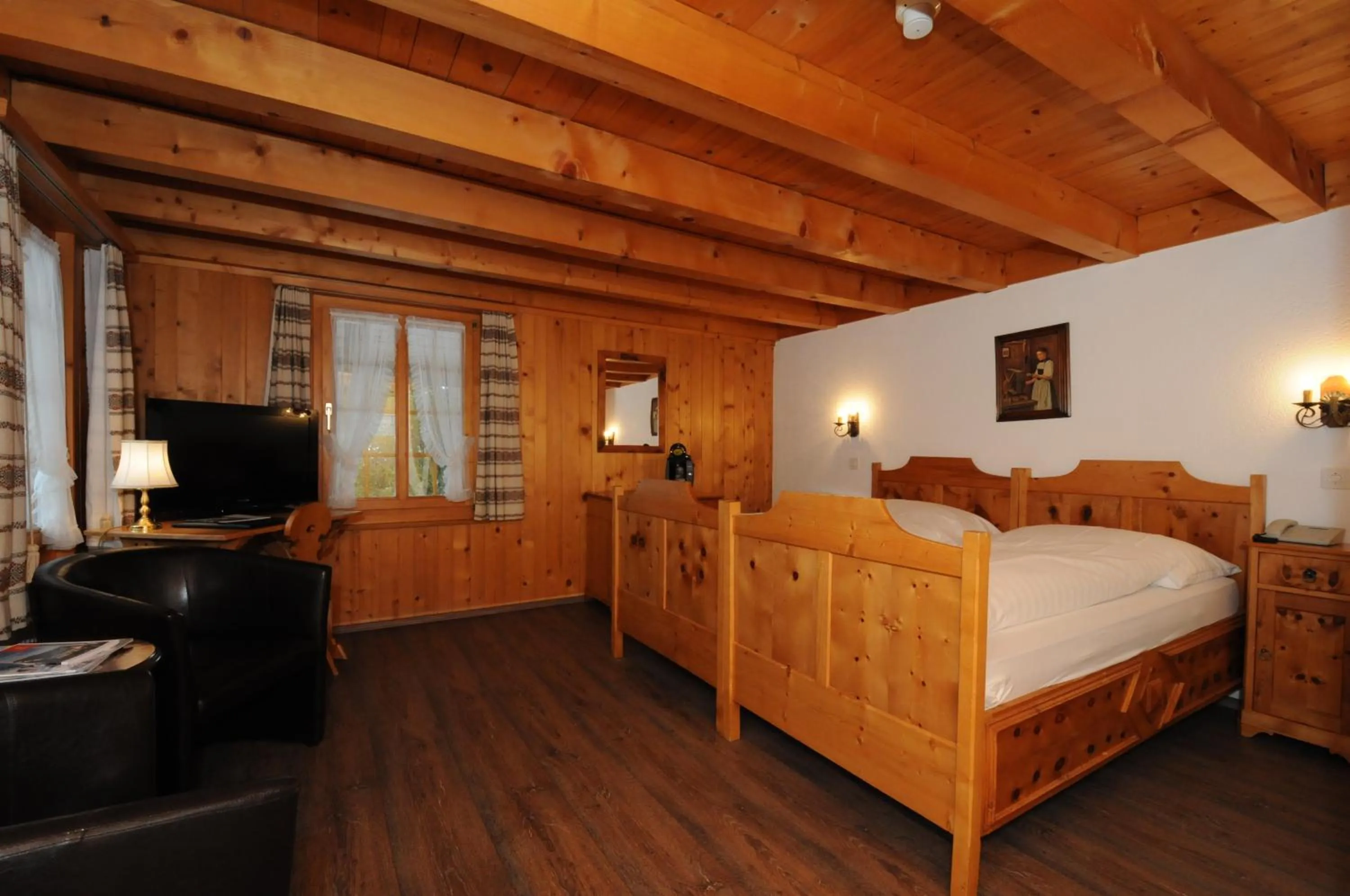 Bed in Belle Epoque Hotel Victoria & Apartments