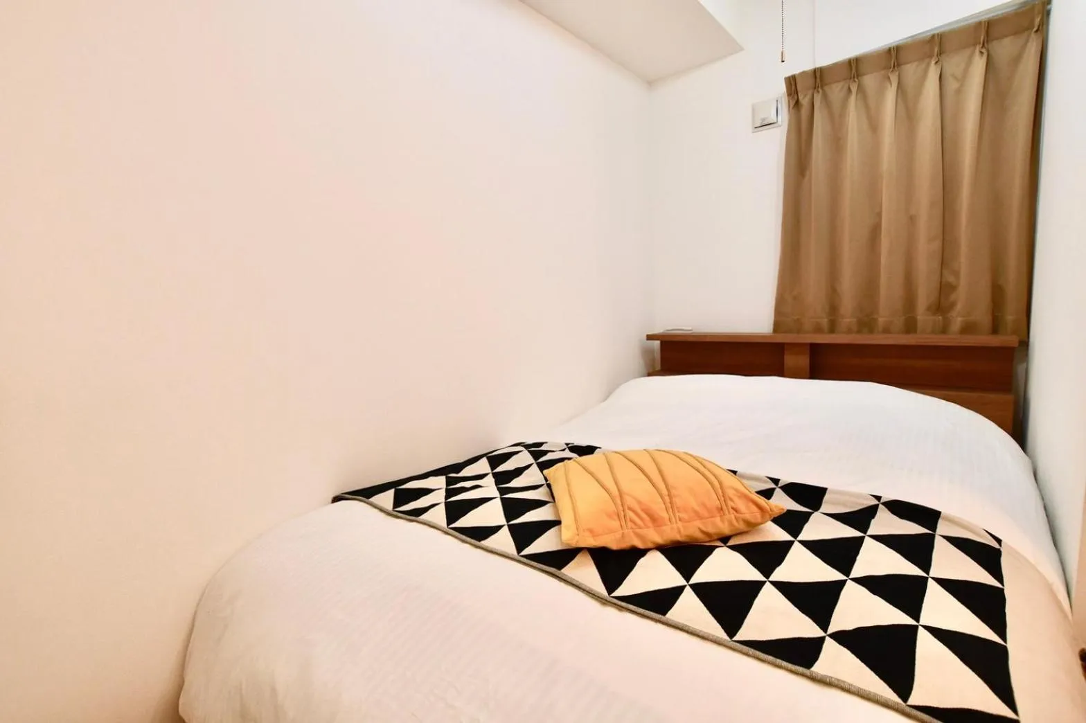 Bed in Riverside Inn Hakata