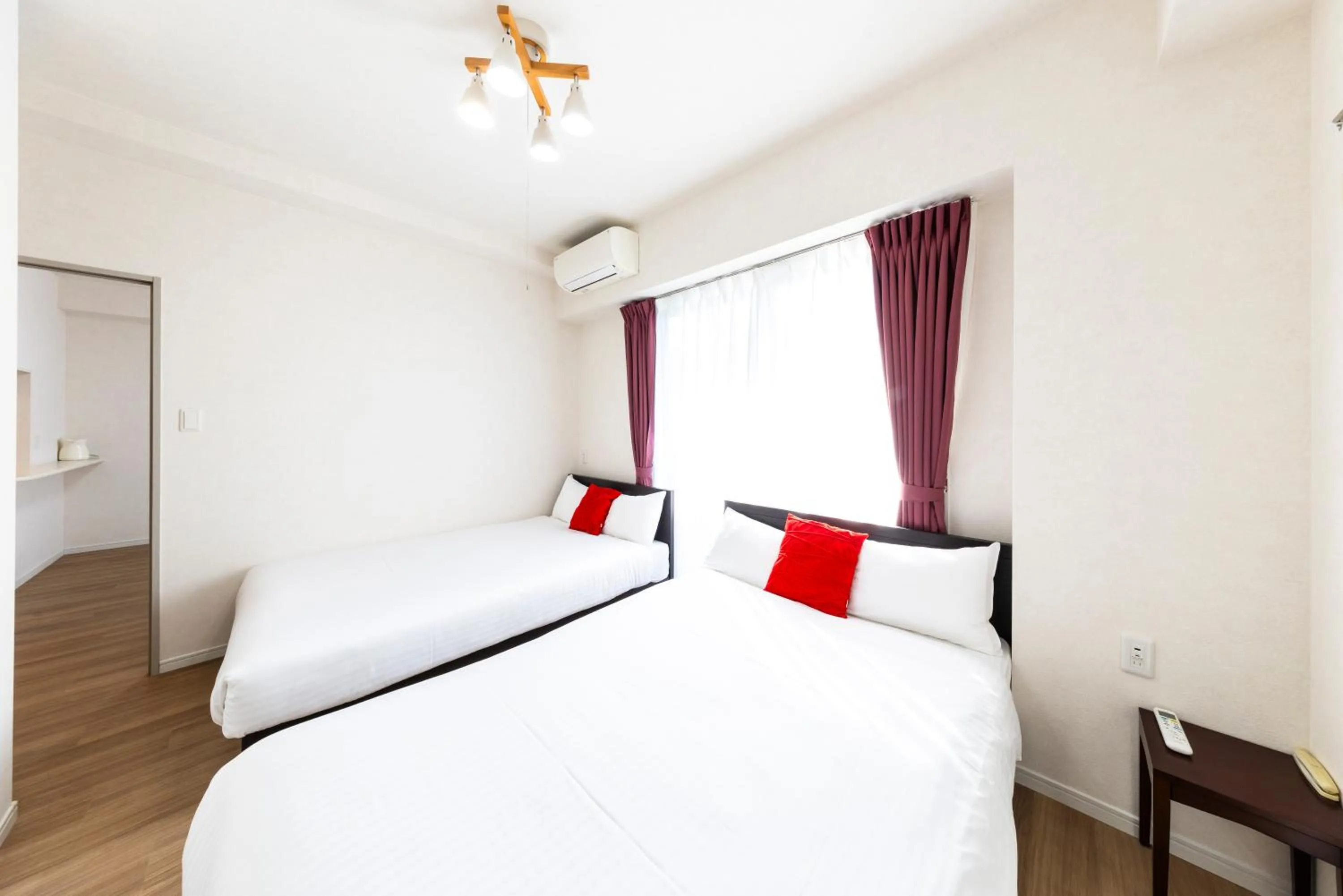 Bed in Riverside Inn Hakata