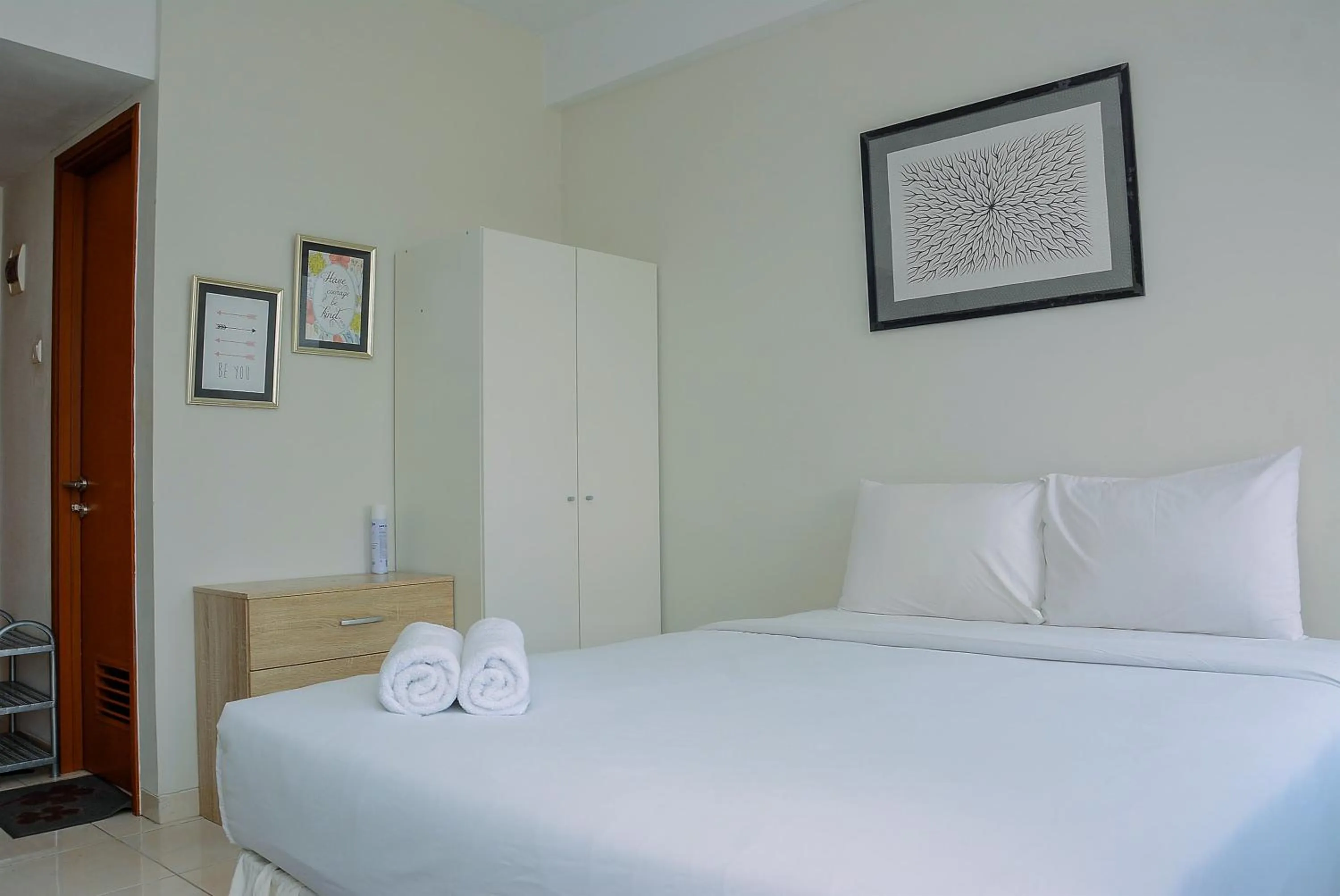 Bed in Elegant Studio Apartment Margonda Residence 5 By Travelio