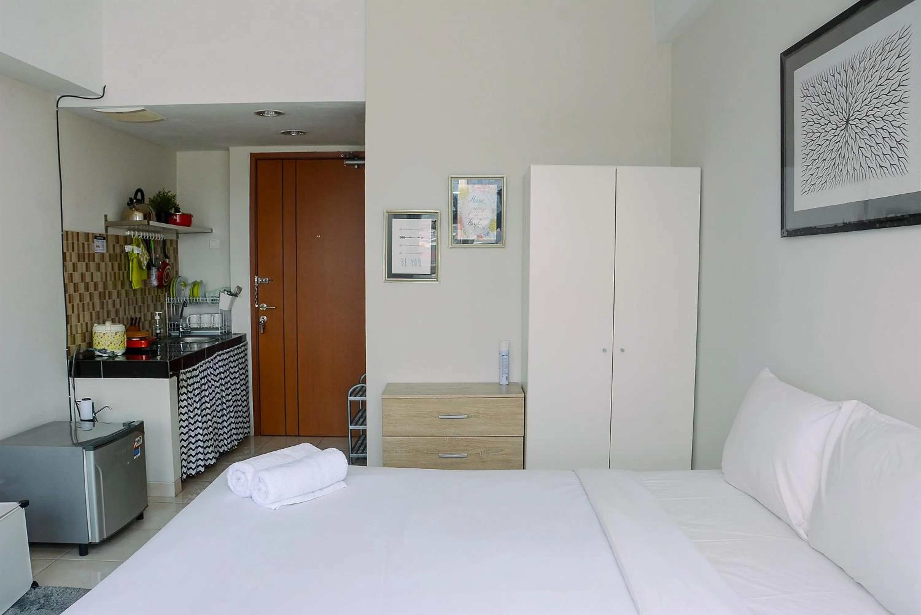 Bed in Elegant Studio Apartment Margonda Residence 5 By Travelio