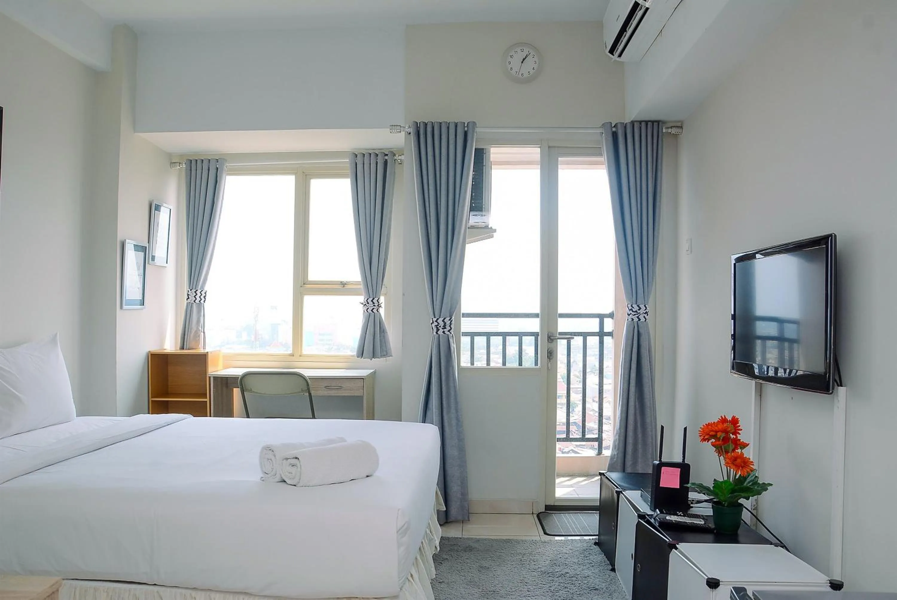 Bed in Elegant Studio Apartment Margonda Residence 5 By Travelio