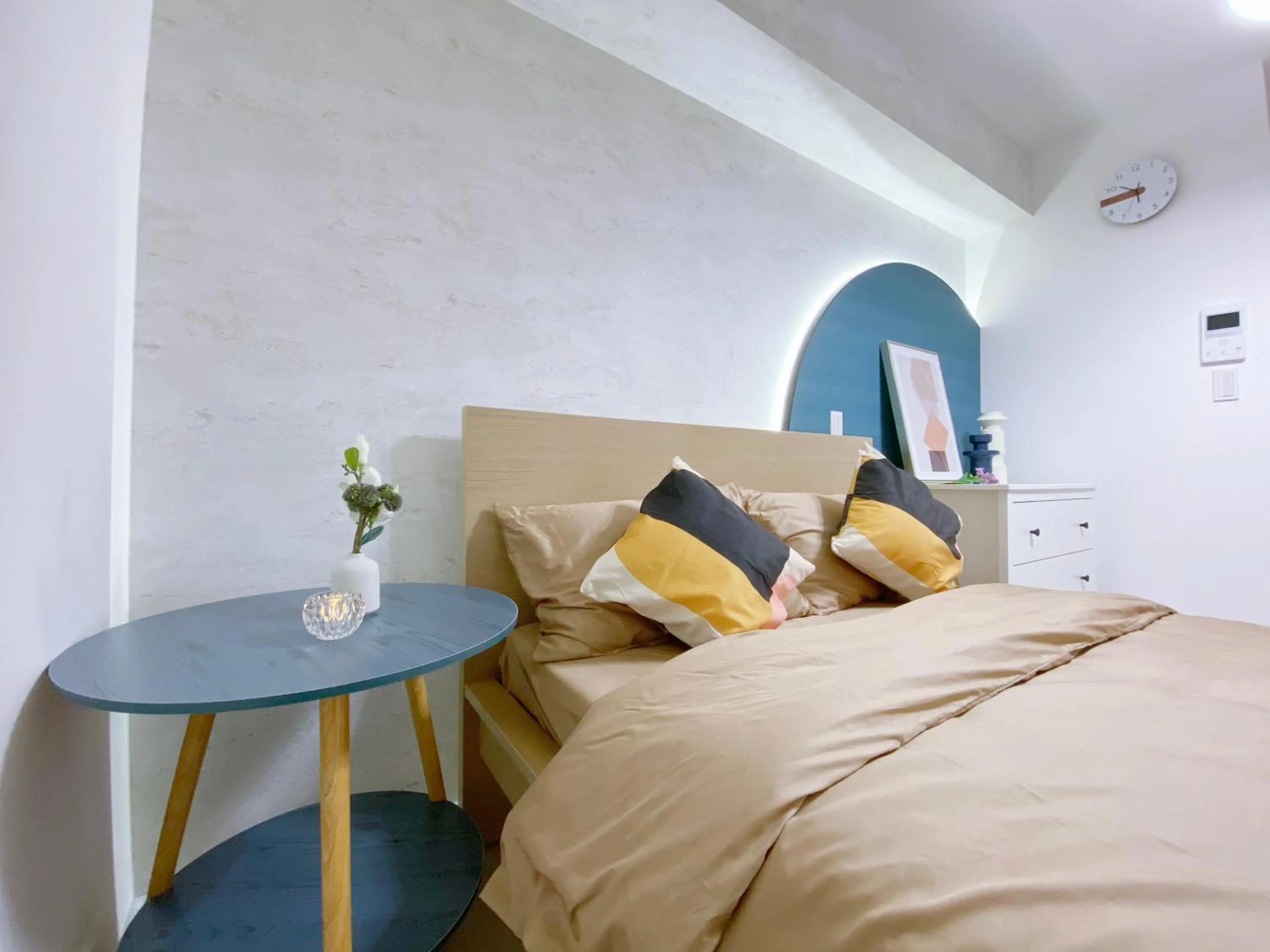 Bed in nestay apartment tokyo ginza