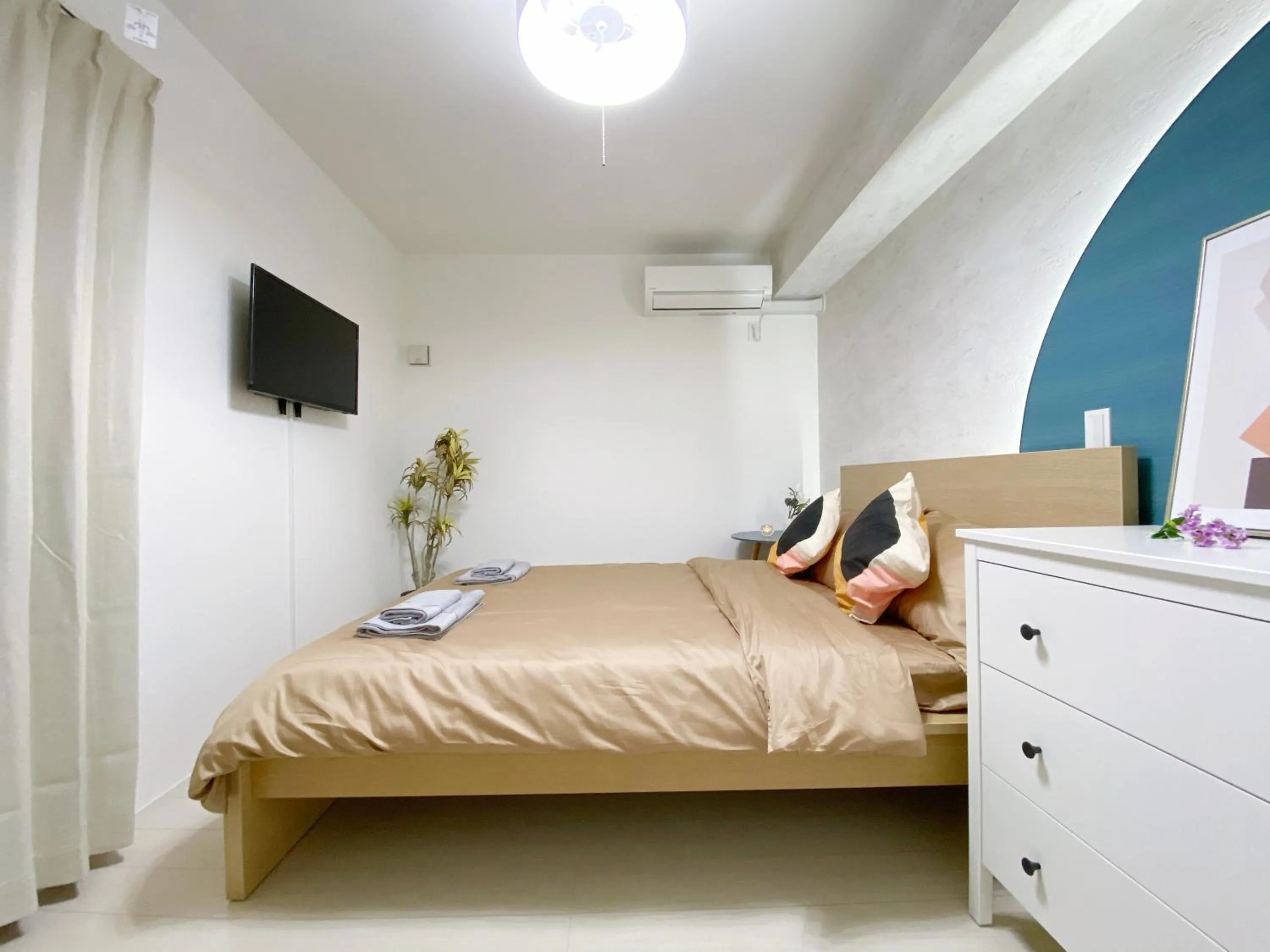 Bed in nestay apartment tokyo ginza