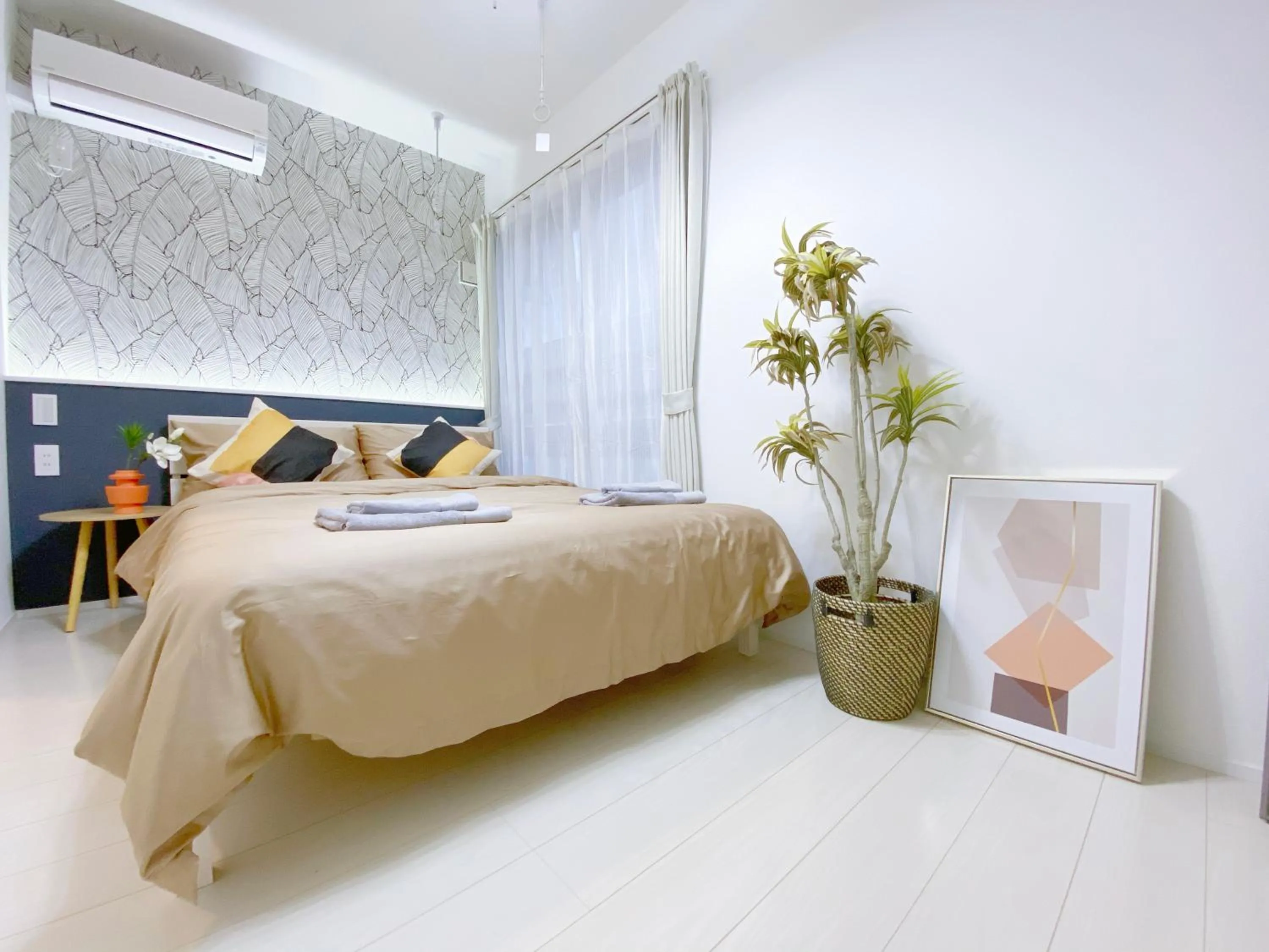 Bed in nestay apartment tokyo ginza