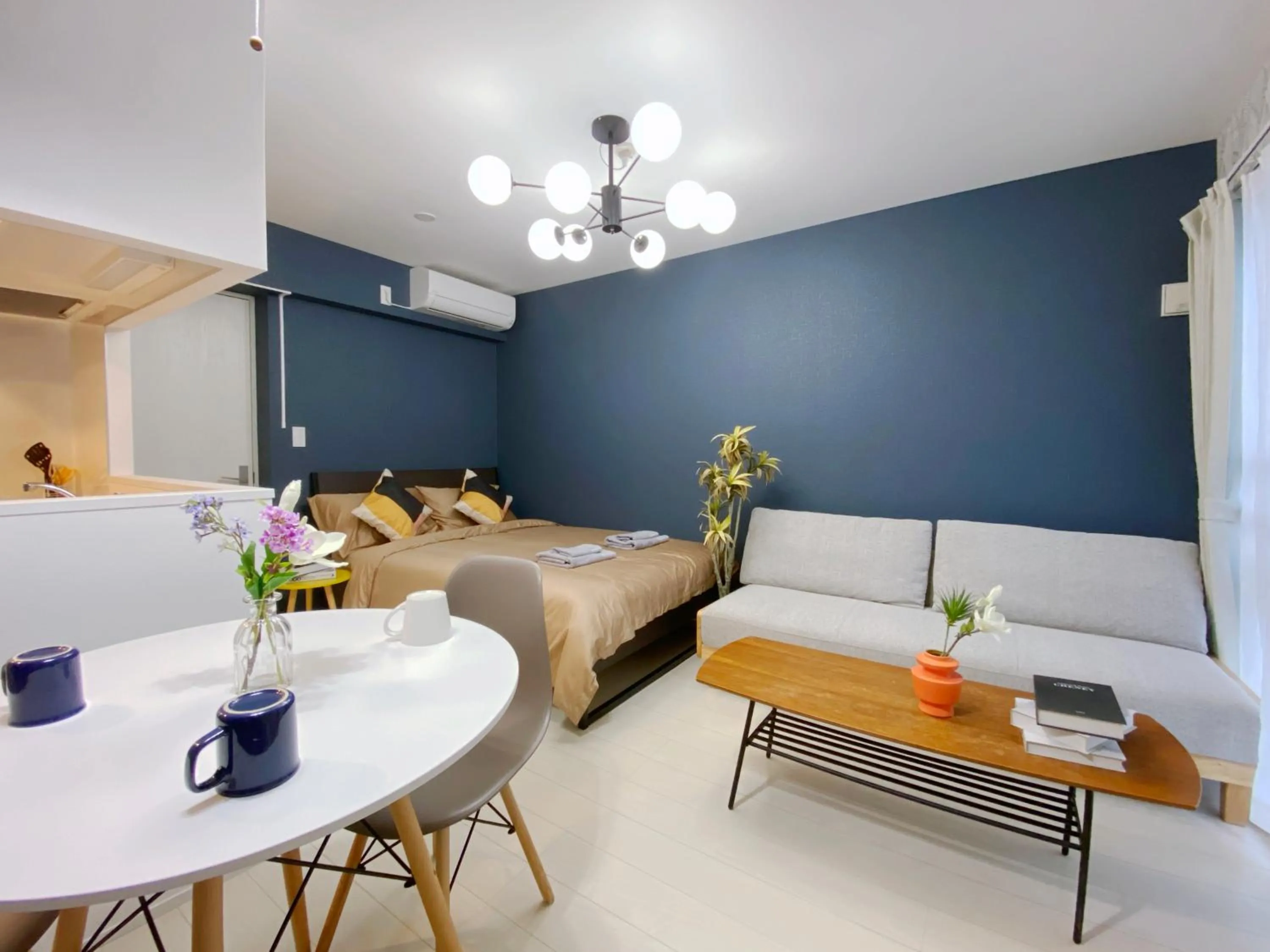 Bed in nestay apartment tokyo ginza