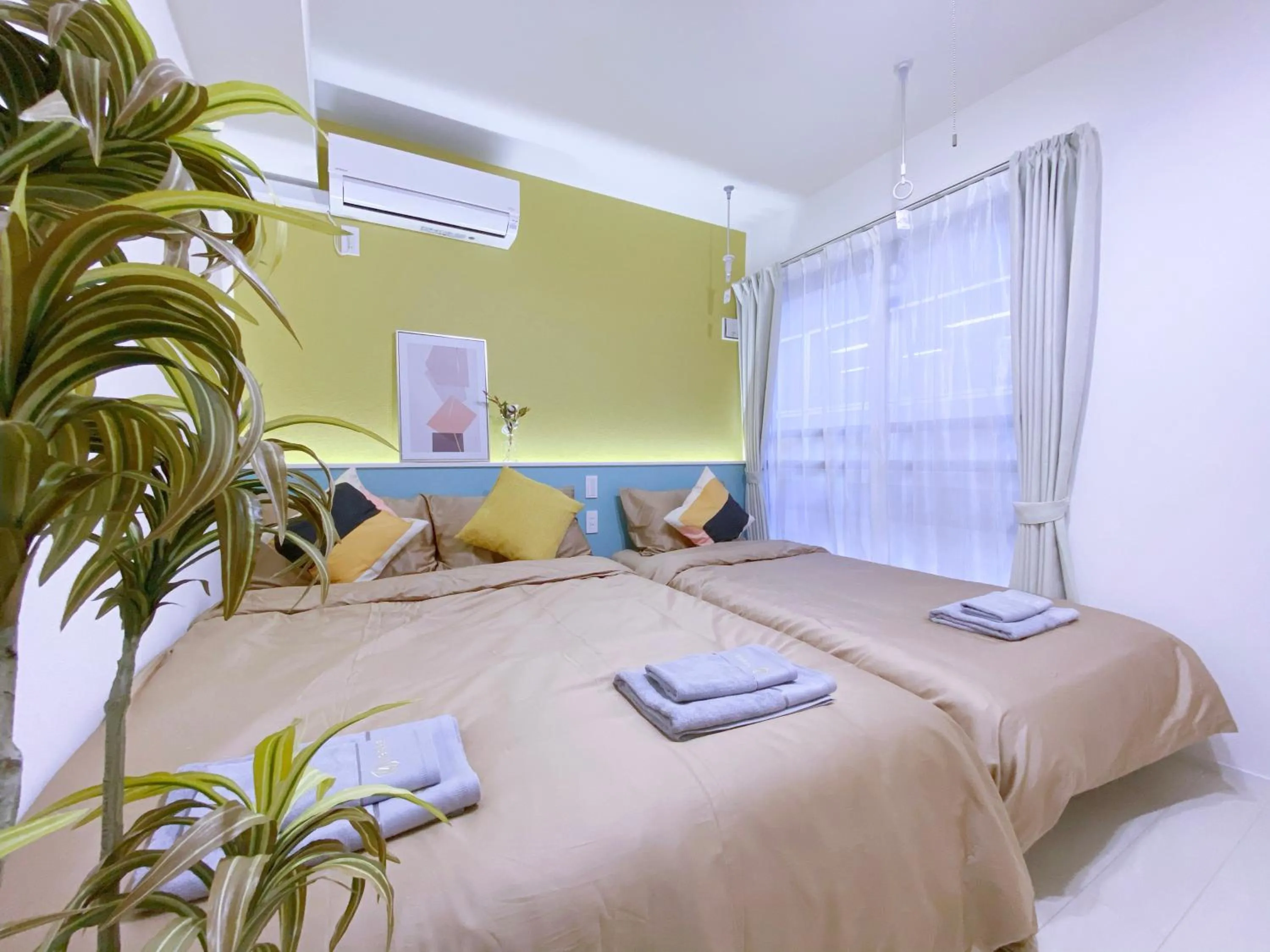 Bed in nestay apartment tokyo ginza