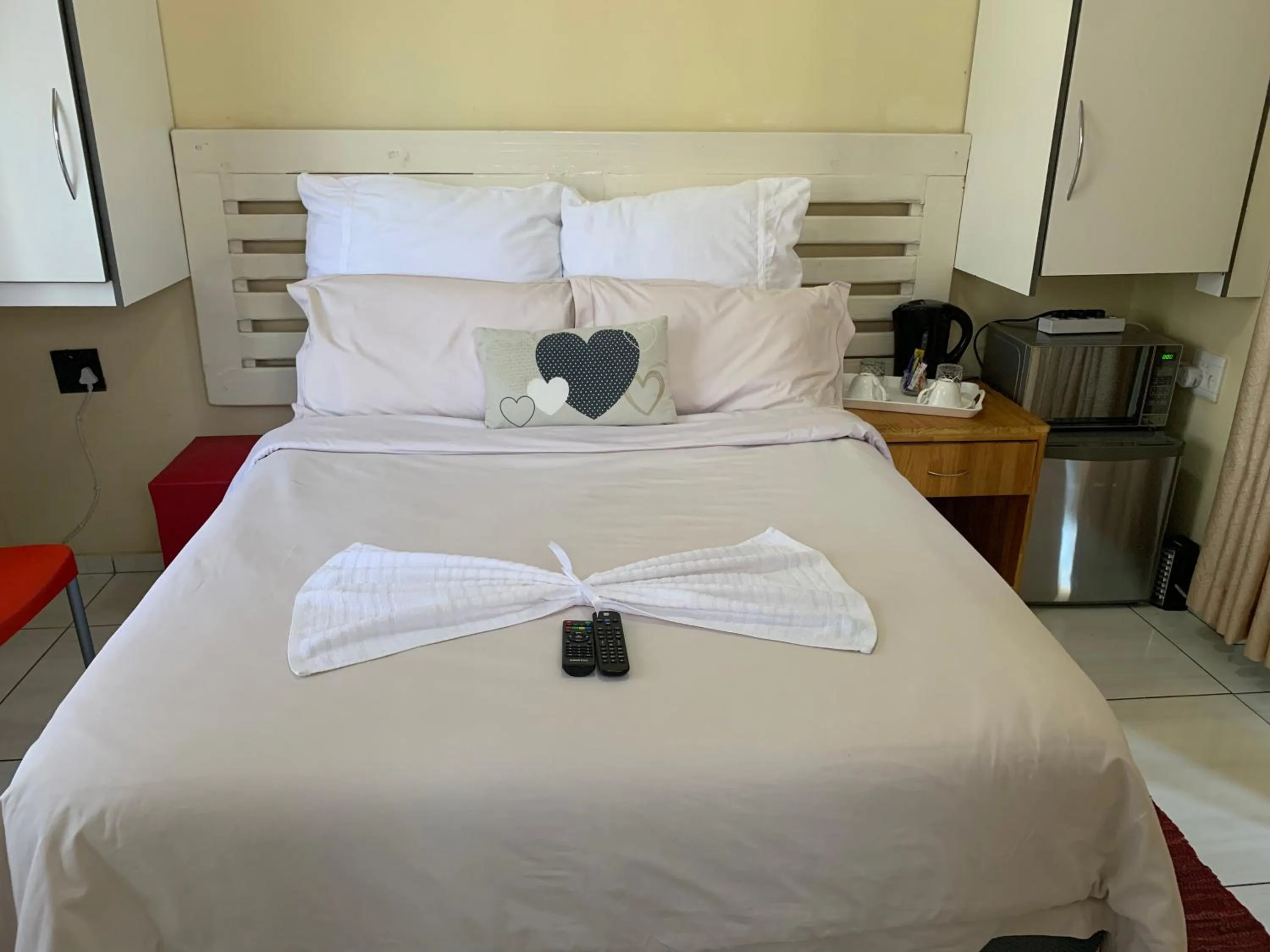 Bed in Ekaya Palace Guest House