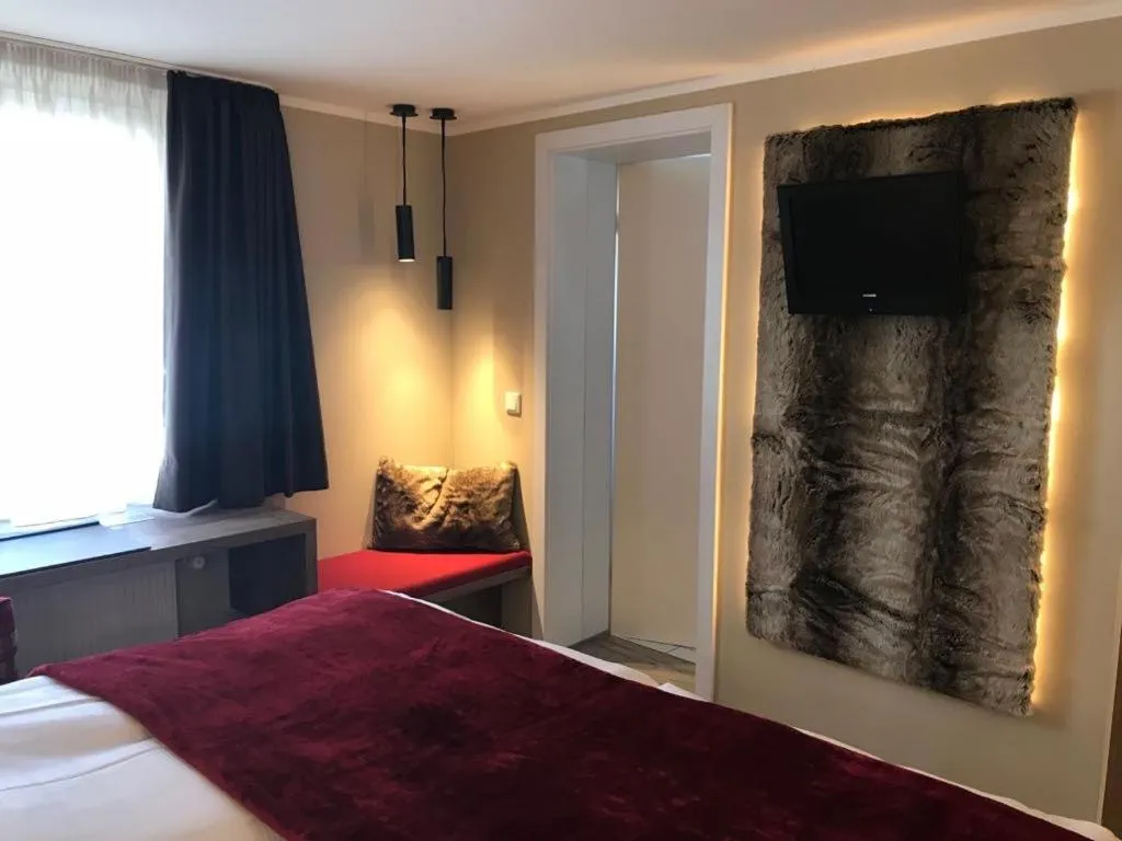 Bed in Romantisches Hotel Menzhausen