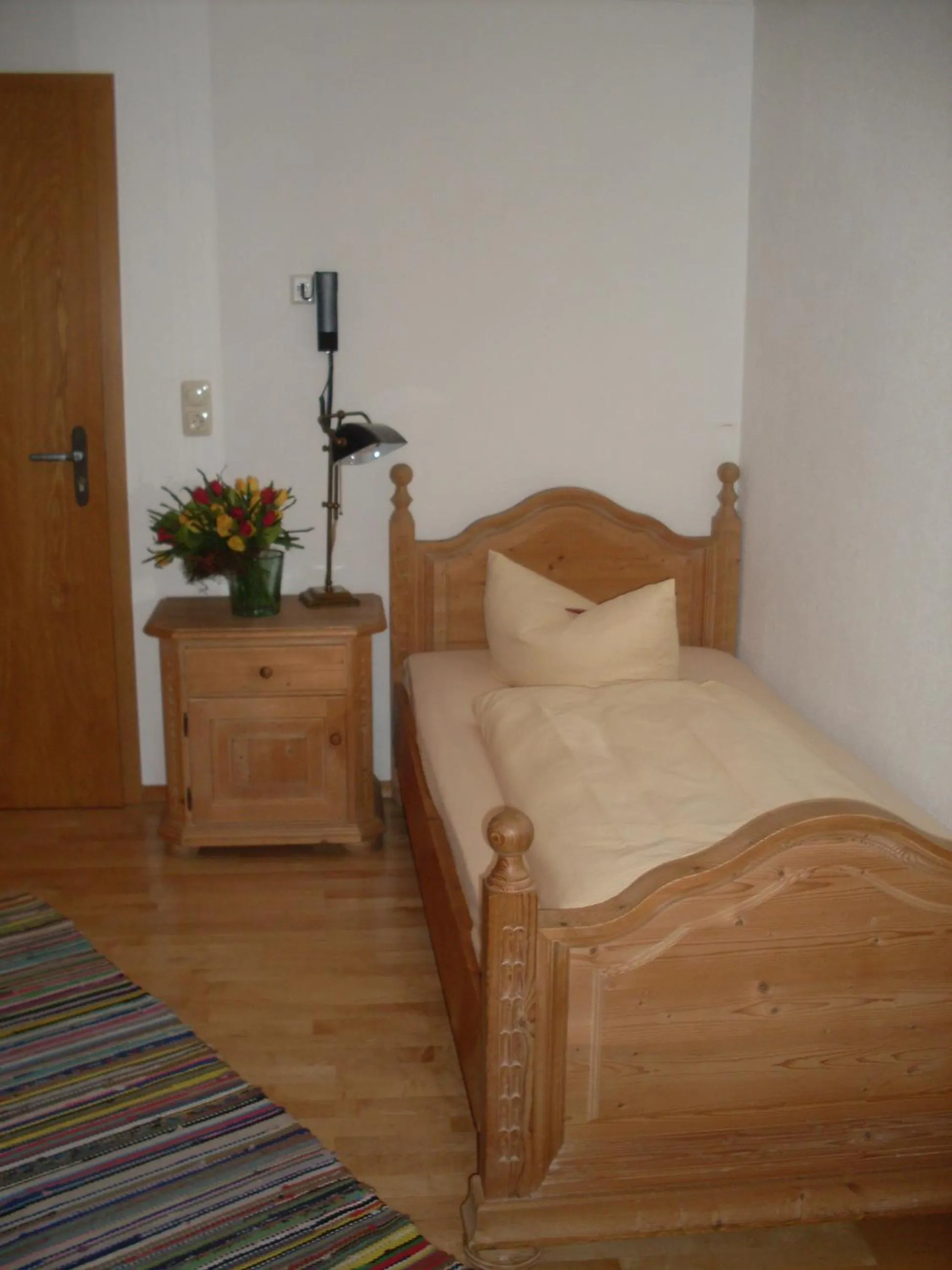 Photo of the whole room, Bed in Gasthof Ochsenwirt