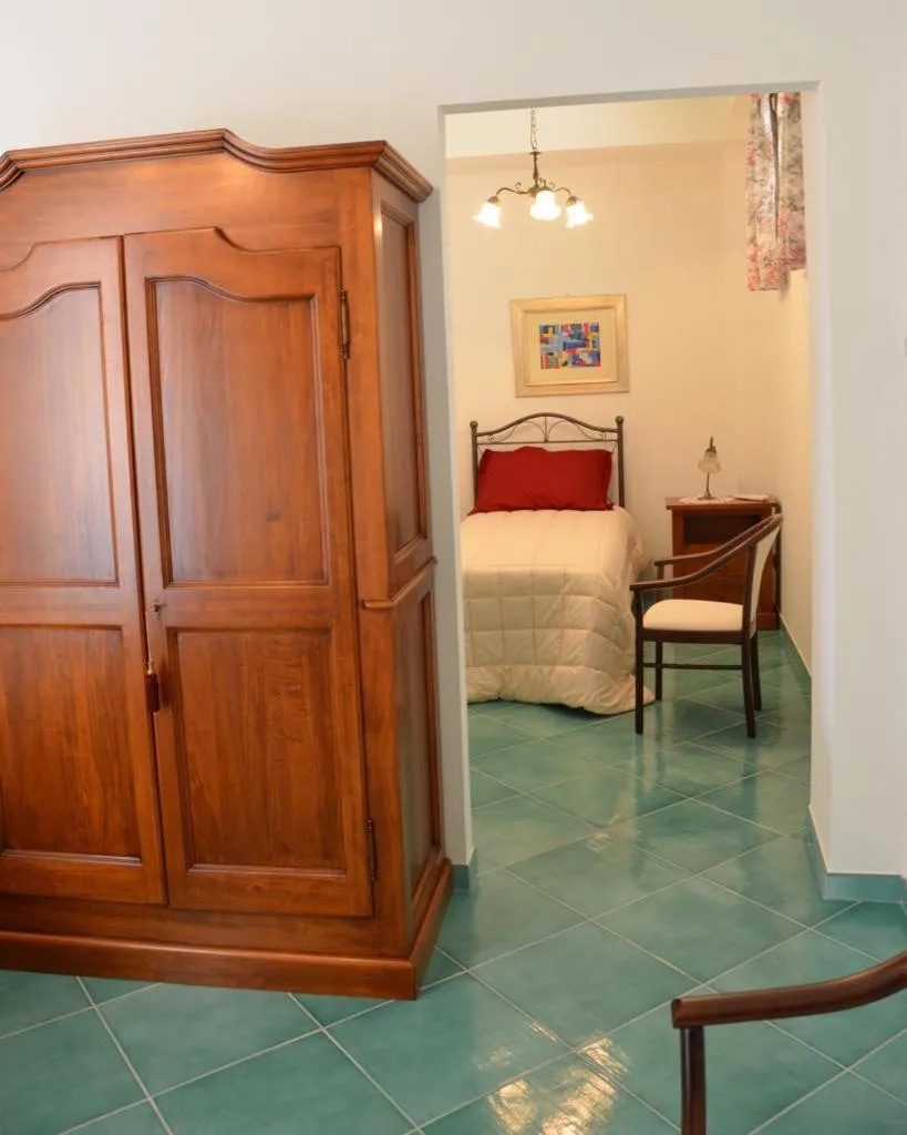 Photo of the whole room, Bed in Donna Alda Affittacamere Capitello dal 2012