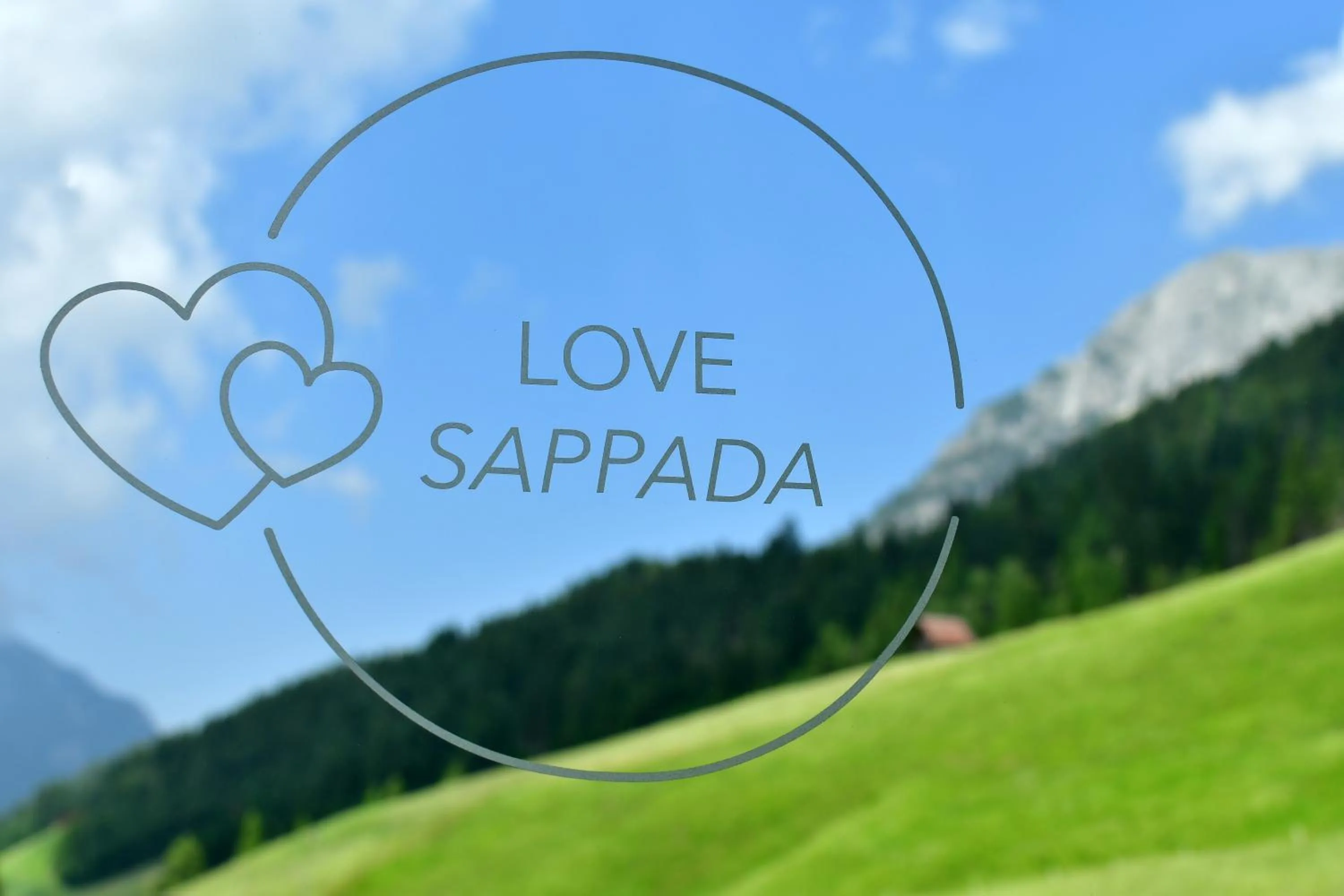 Property logo or sign in Maison Boutique Fior d'Alpe