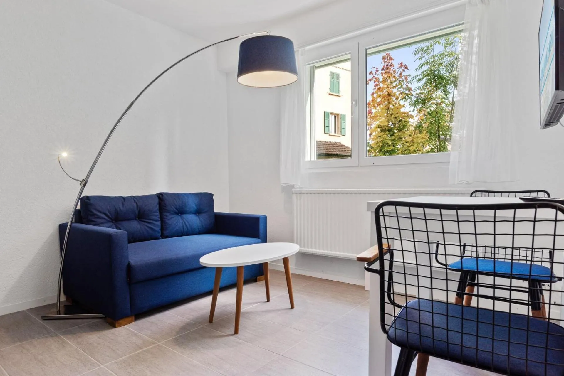 Seating area in Berne 2 - Self Check In by Homenhancement