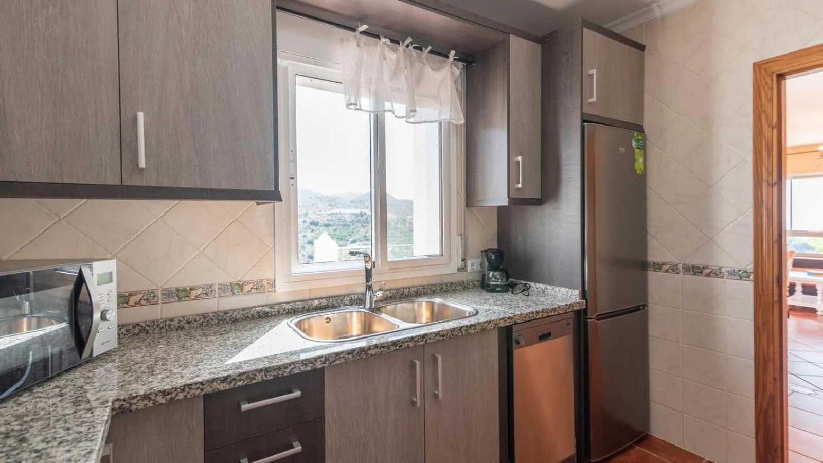 Kitchen or kitchenette in Cortijo Albaricoque Frigiliana by Ruralidays