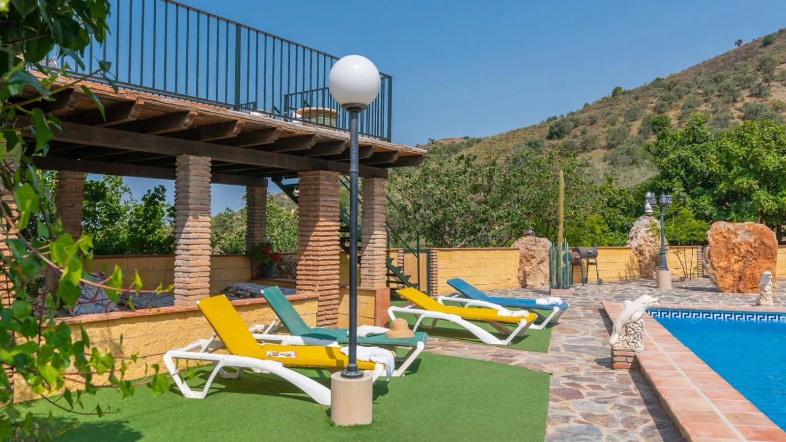 Swimming pool in Villa Paraiso Andaluz Sedella by Ruralidays
